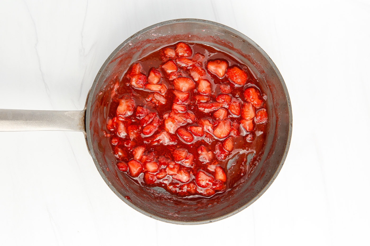 strawberry sauce in a saucepan