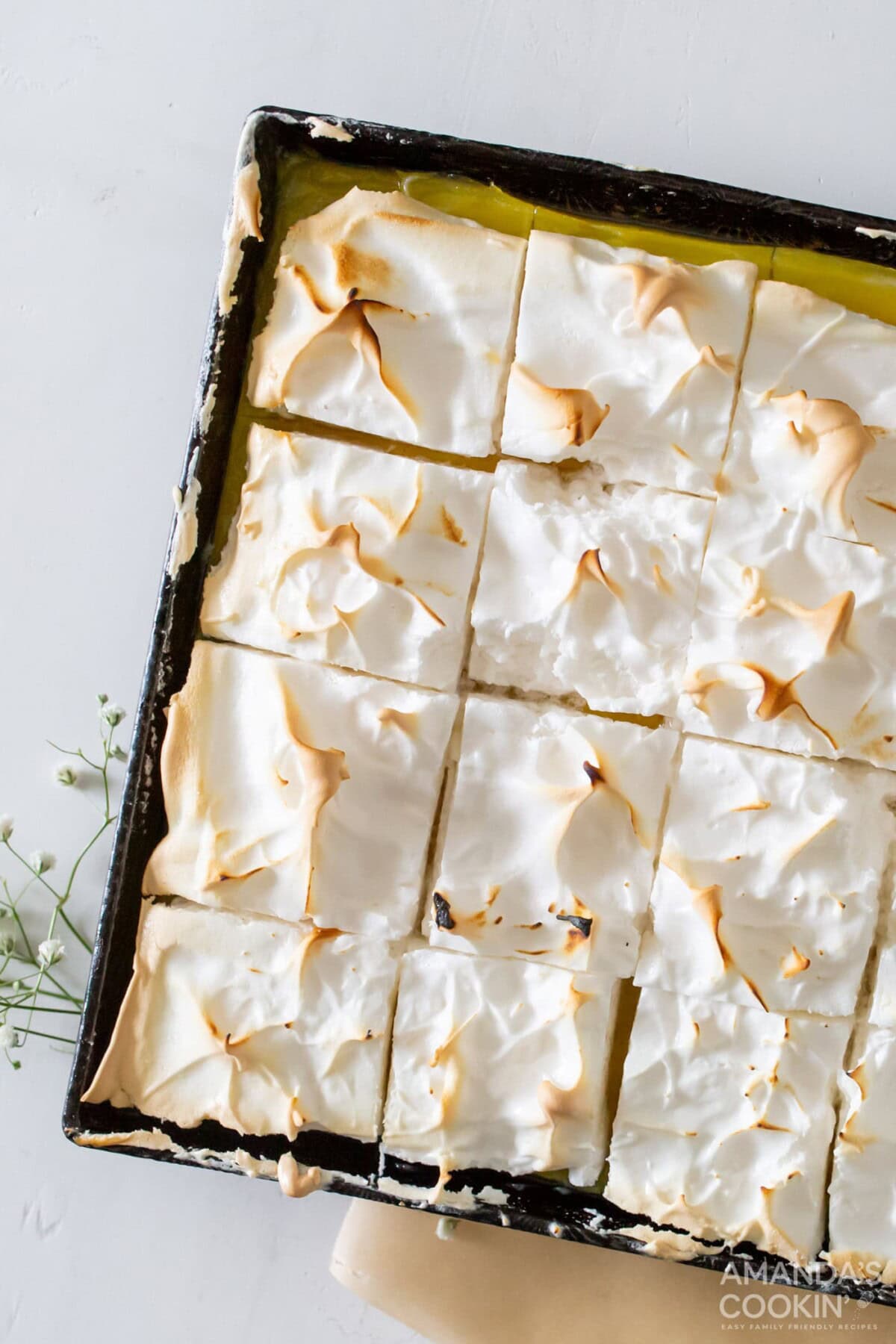 pan of Lemon Meringue Pie Bars cut into squares