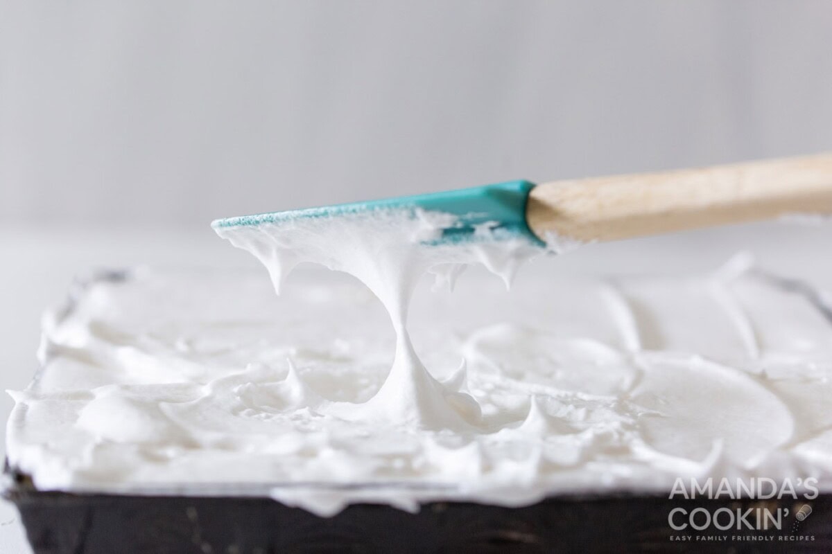 rubber spatula making lemon meringue peaks