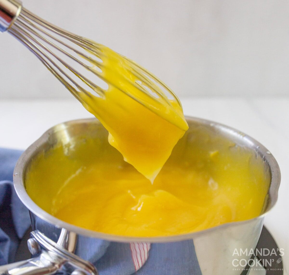 lemon custard on a whisk