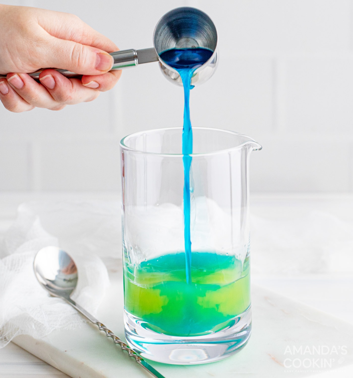 adding blue curacao to glass