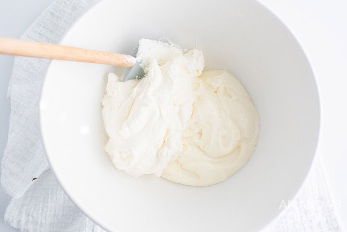 cheesecake and whipped topping mixture in a bowl