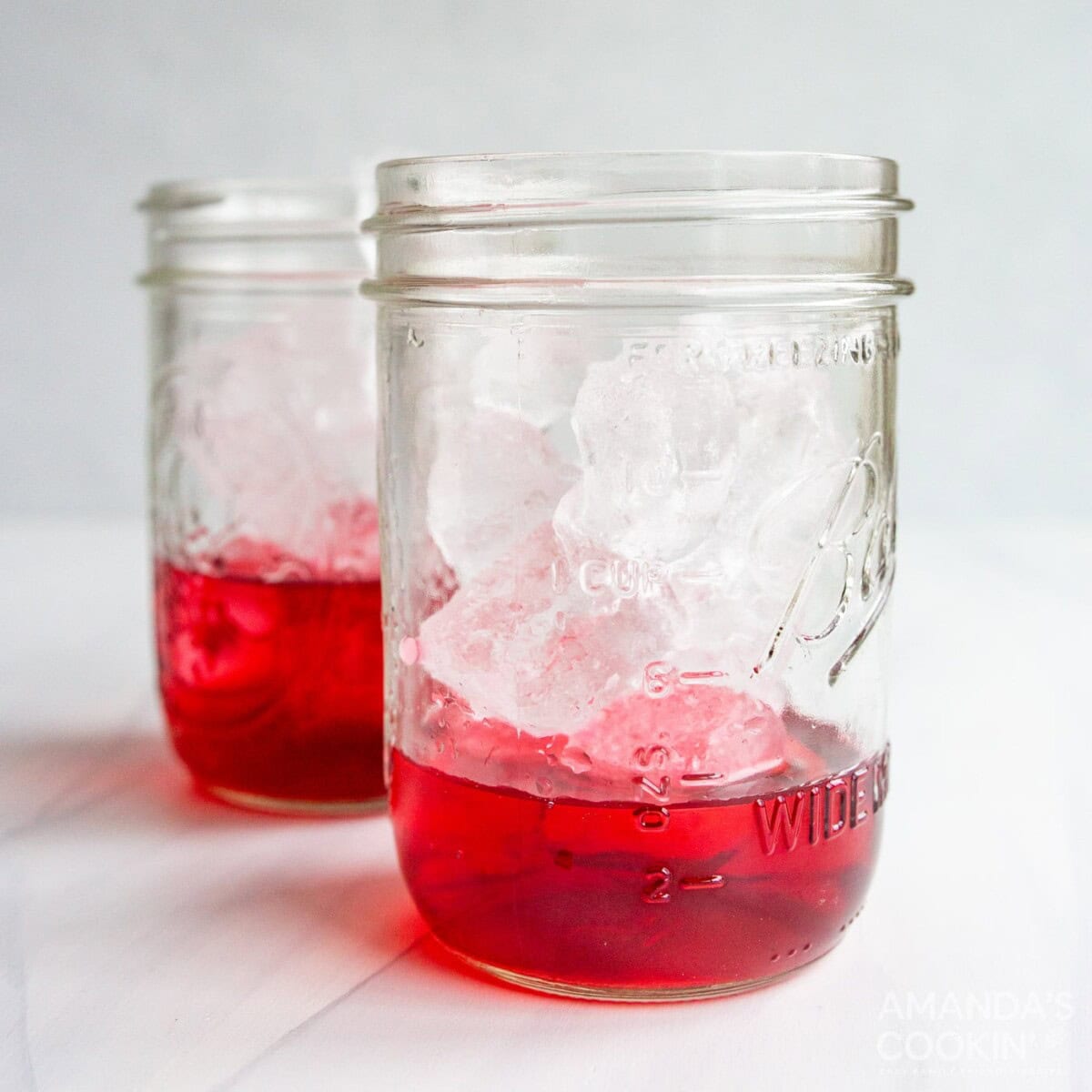 ice in mason jar with cran-raspberry juice