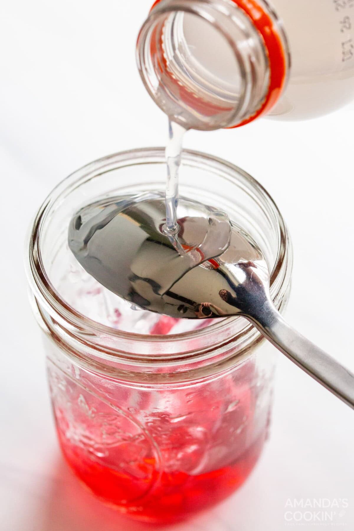 pouring frost gatorade over a spoon