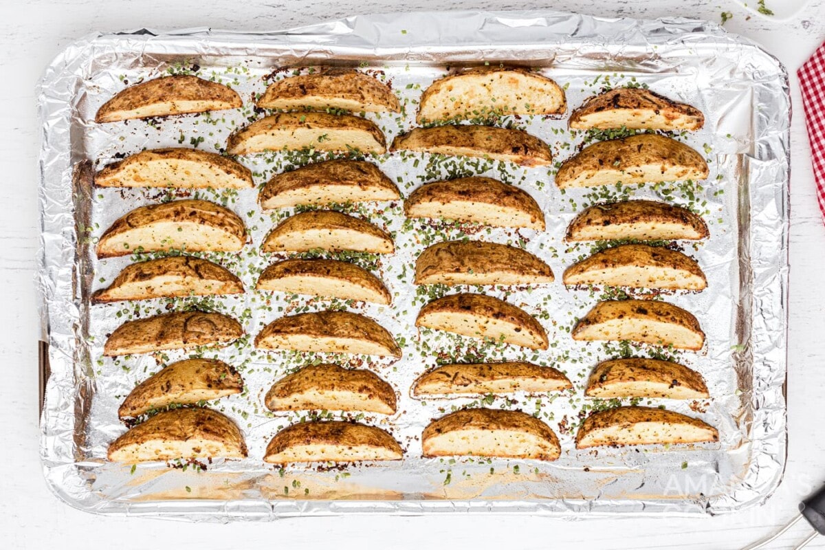 roasted potato wedges on baking sheet