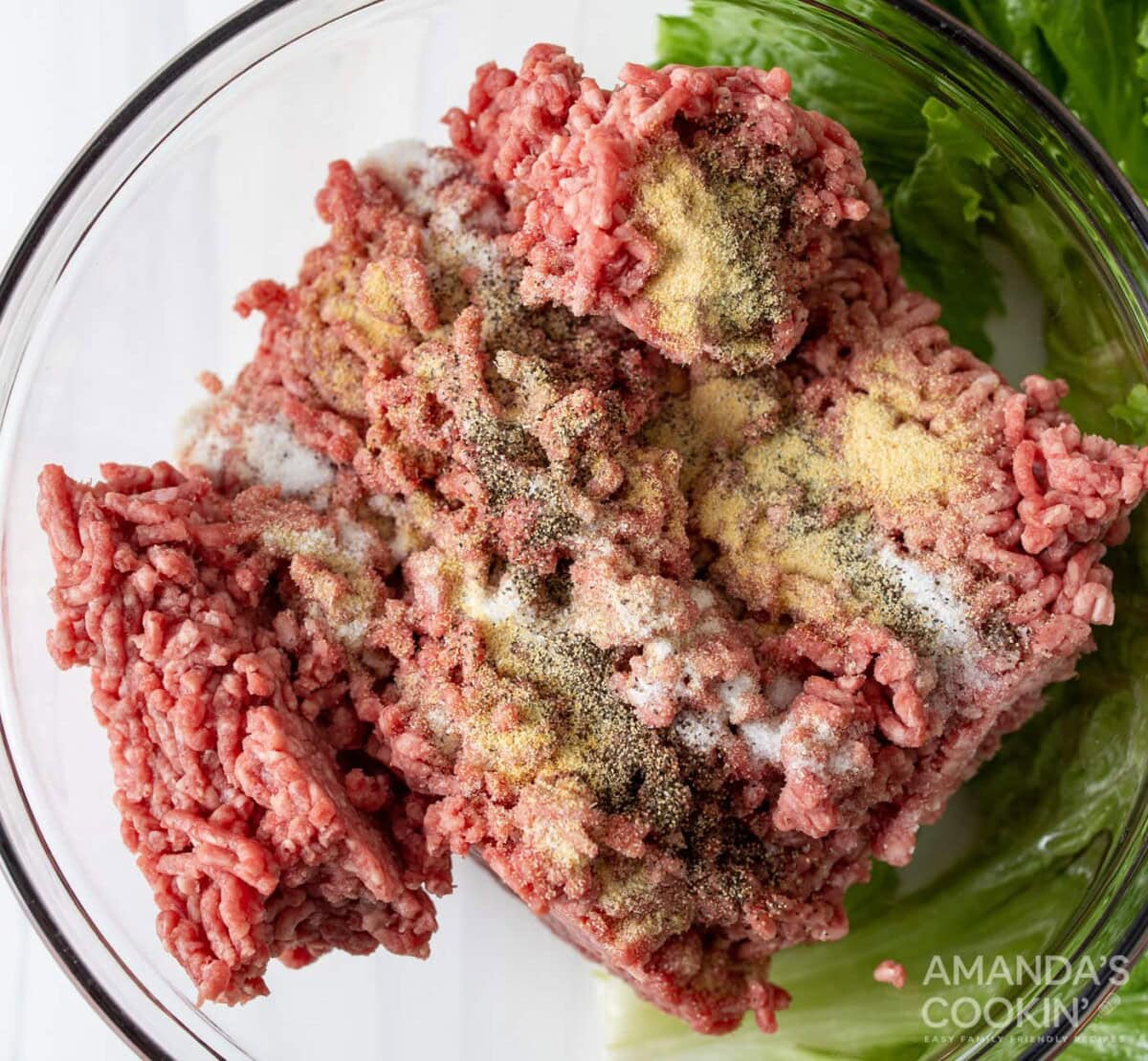 ground beef and seasonings in a mixing bowl