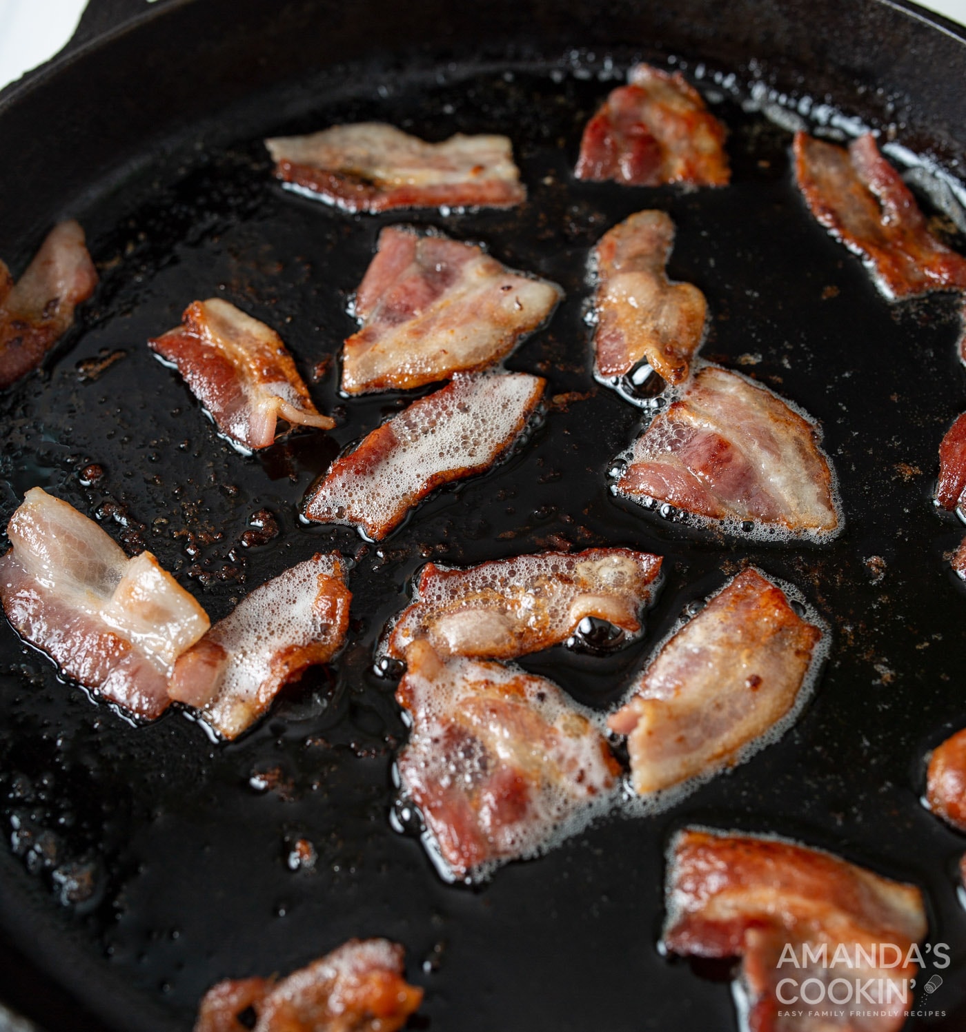 bacon cooking on a skillet