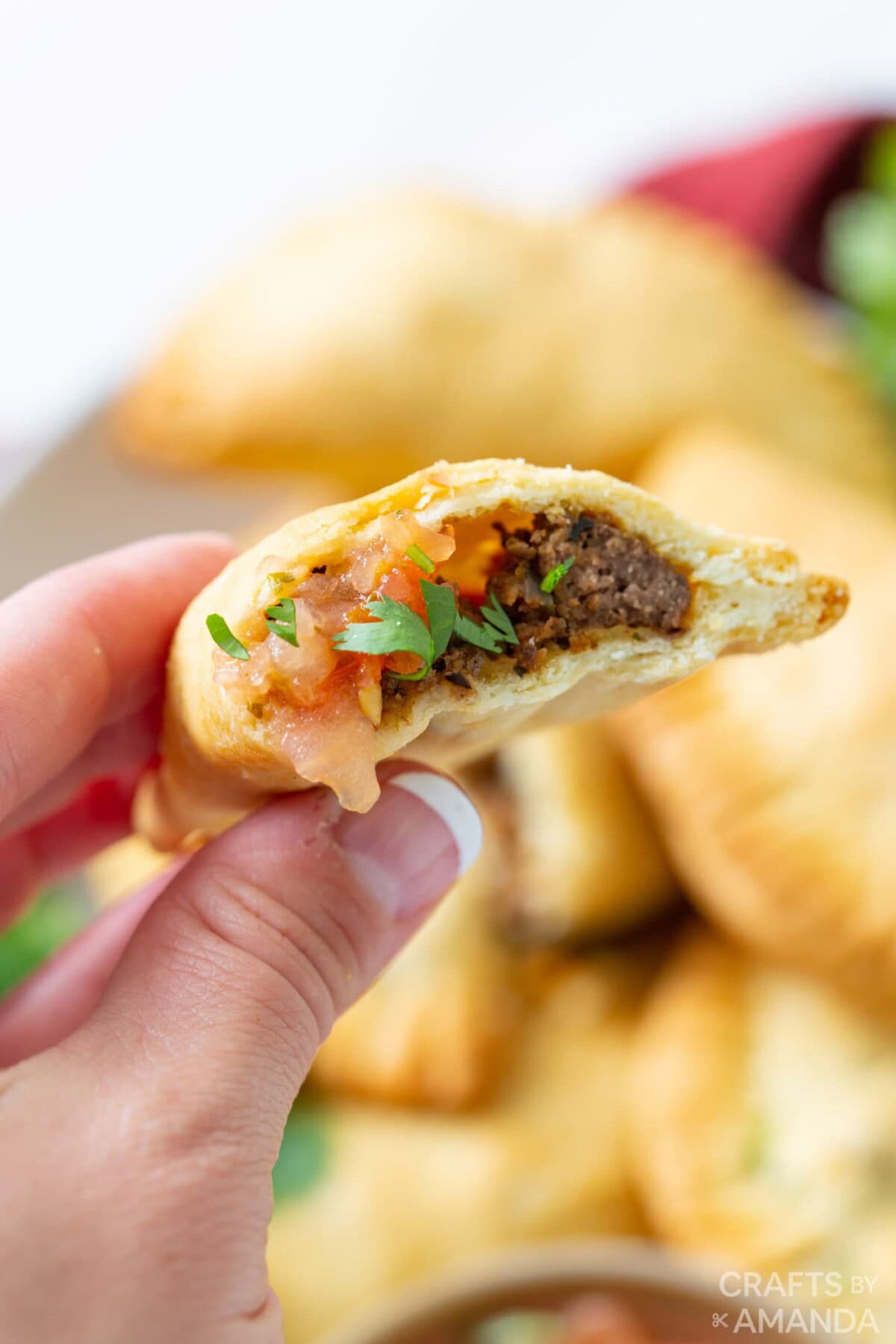 close up of inside of air fryer empanadas