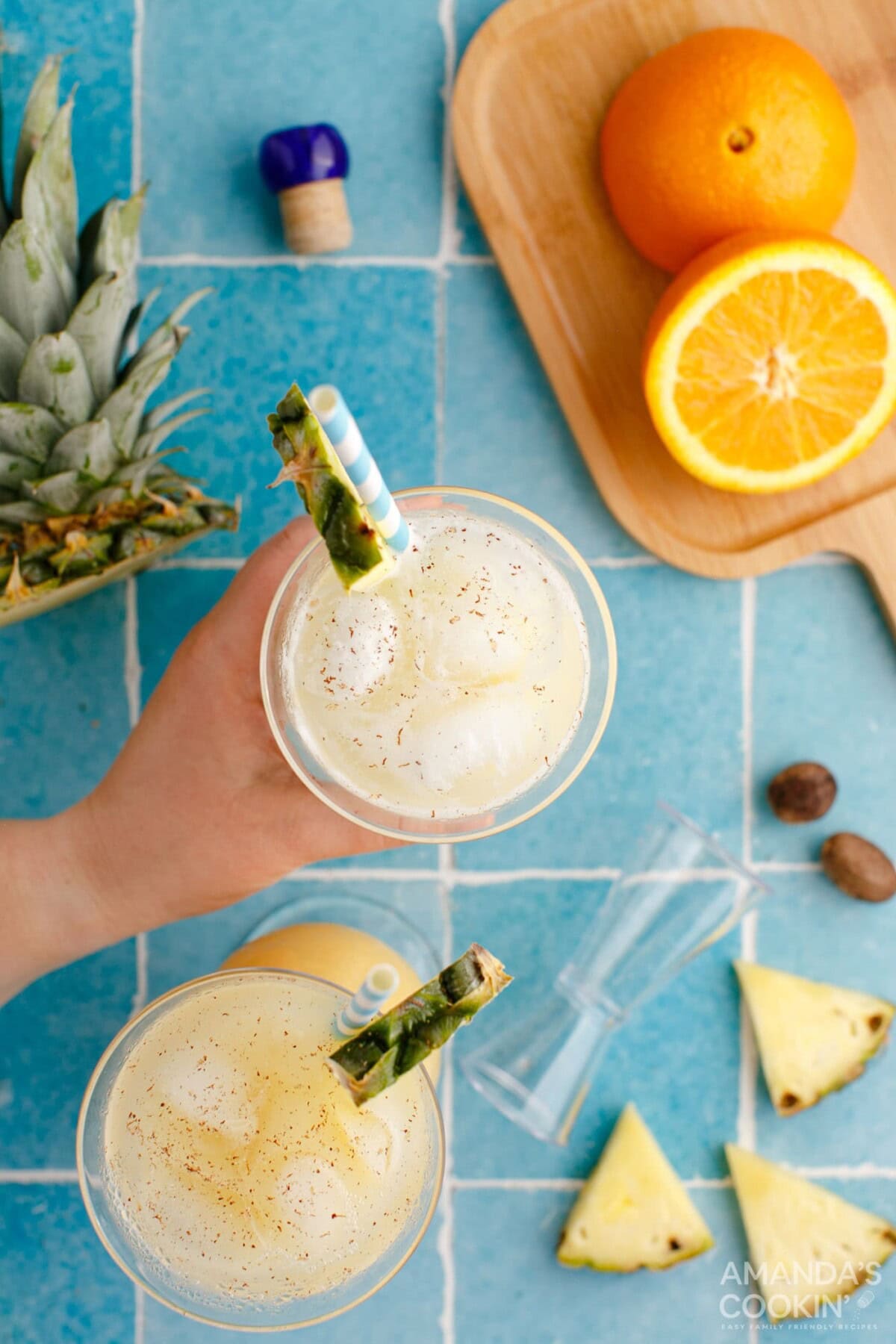 hand picking up cocktail
