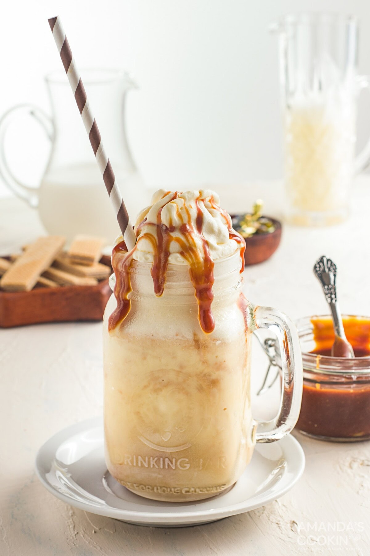 salted caramel milkshake in a mason jar glass
