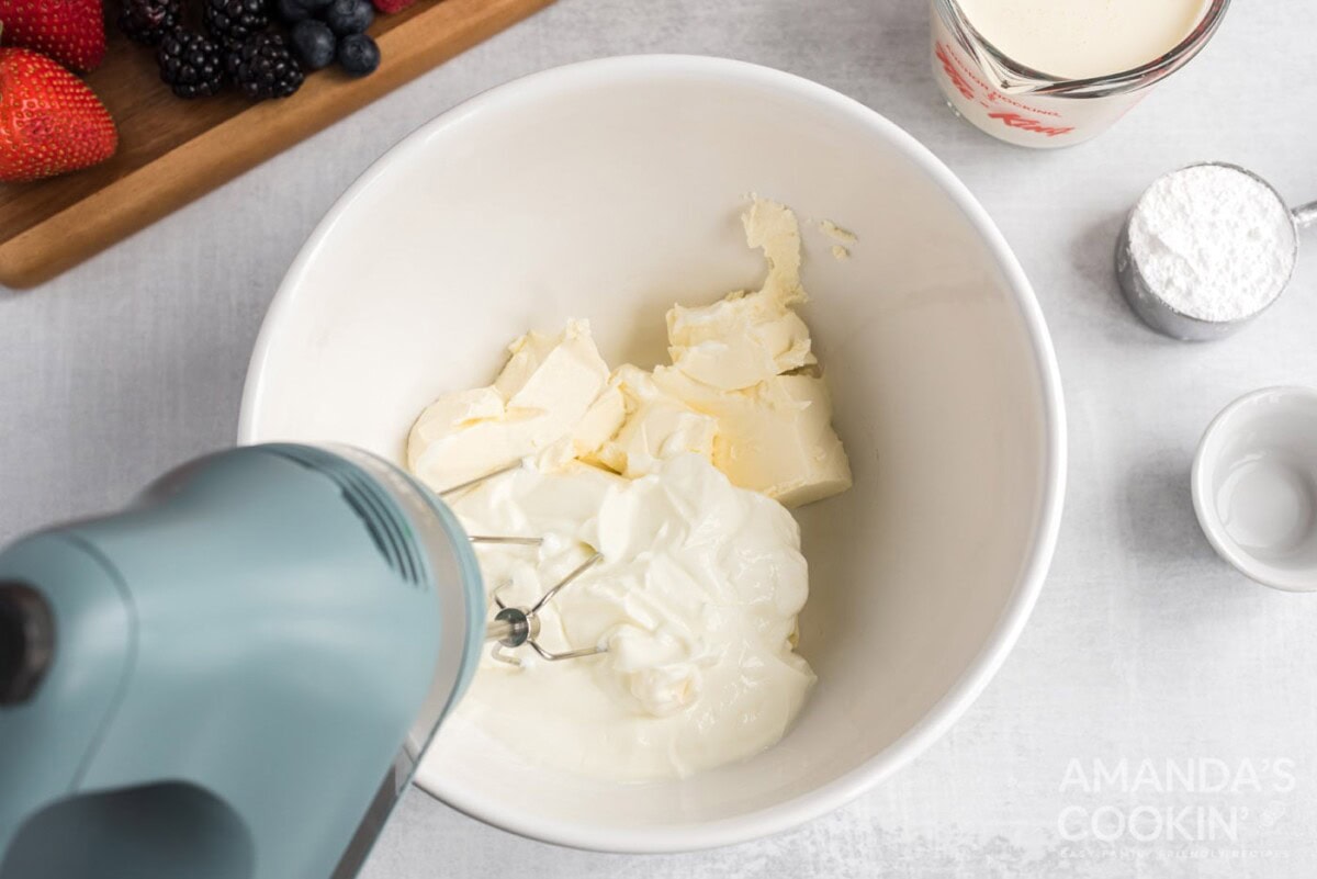 cream cheese and greek yogurt with hand mixer