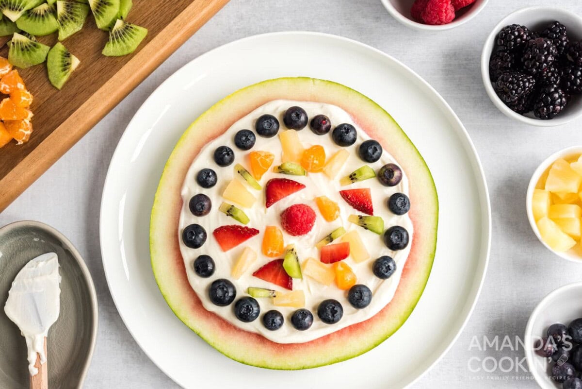watermelon slice with fruit and cream cheese yogurt layer