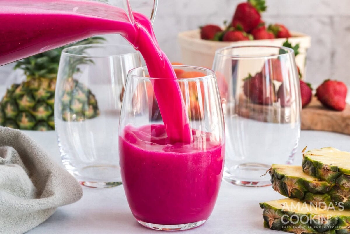 pouring wine slushy into a glass