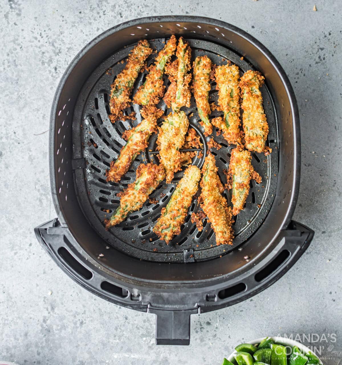 golden brown cooked jalapeno fries in the air fryer
