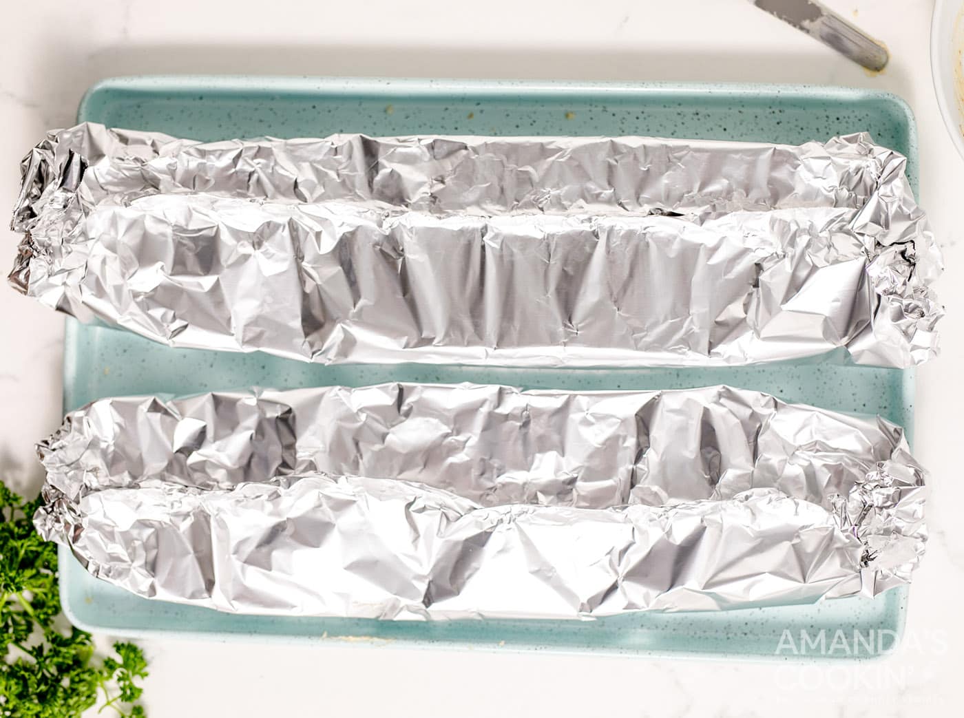 french bread wrapped in aluminum foil