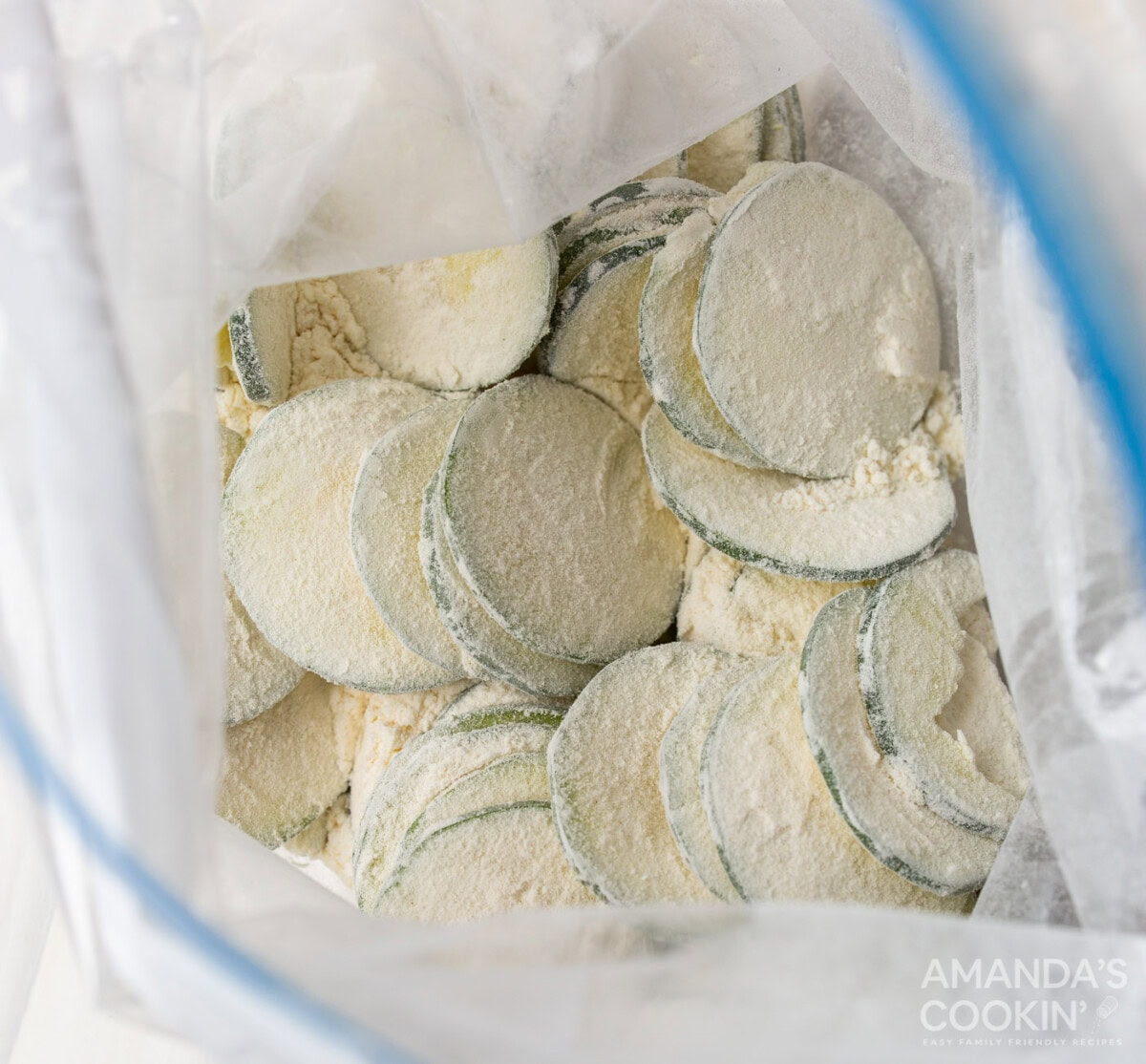 zucchini slices in a bag with flour