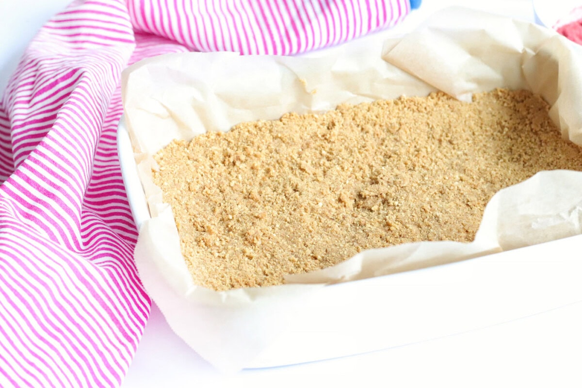 graham cracker crumb crust in a baking dish