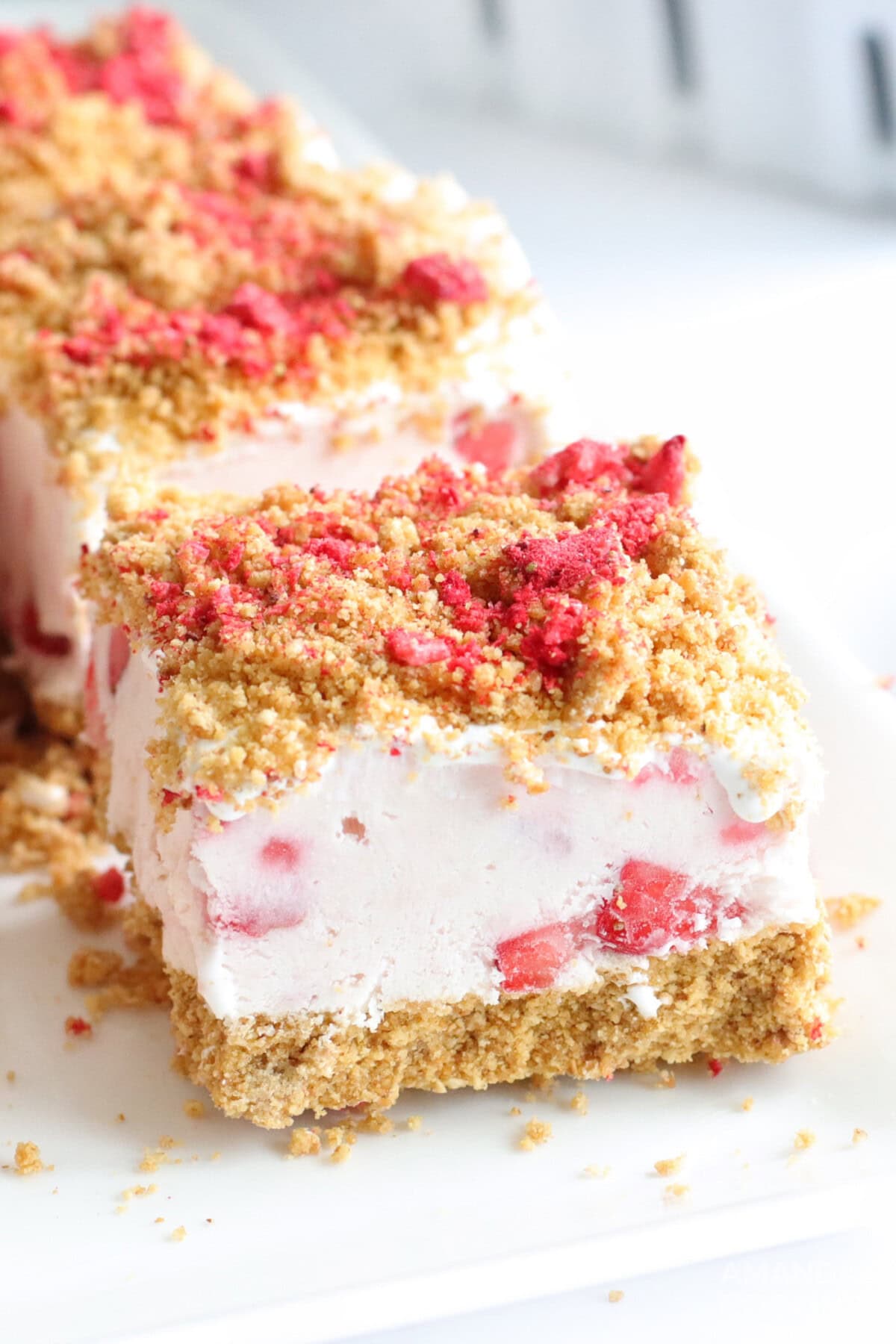 slice of No Bake Strawberry Cheesecake Bars
