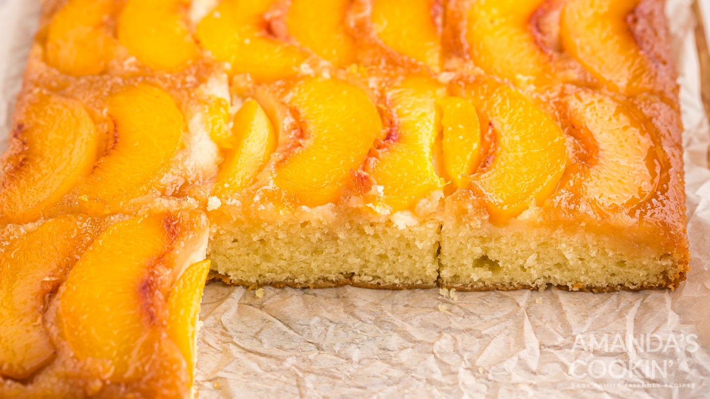 Peach upside down cake starts with a brown sugar caramelized peach base that's flooded with an almon