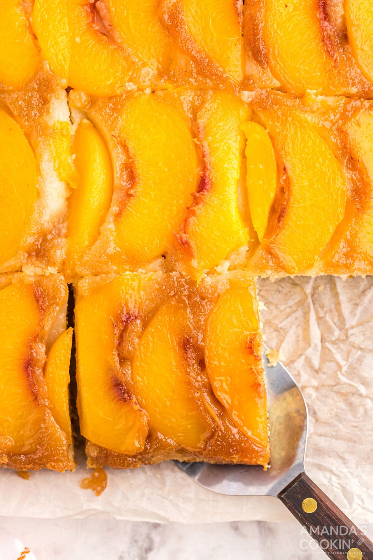 overhead shot of sliced Peach Upside Down Cake
