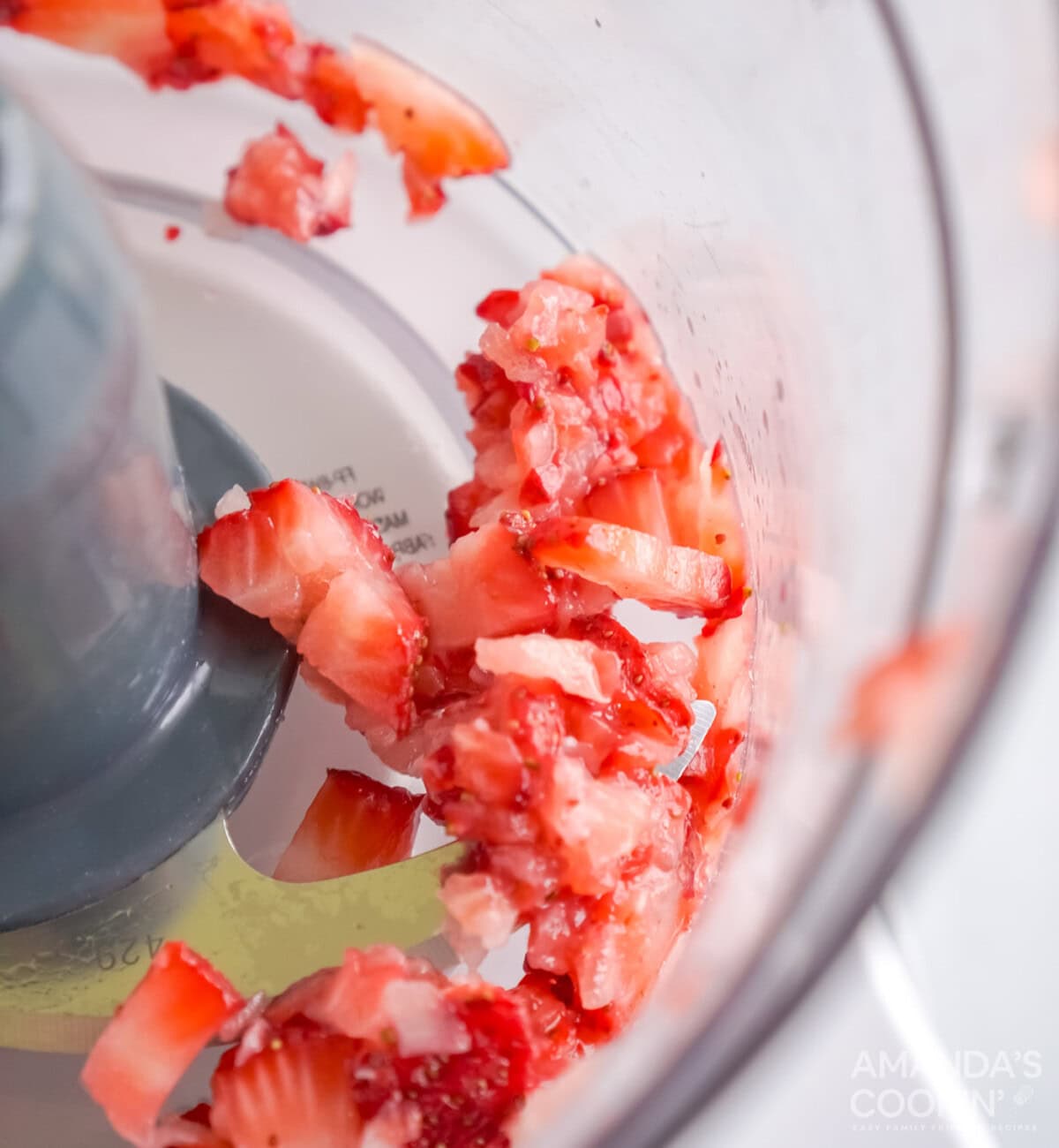 blending strawberries in a food processor