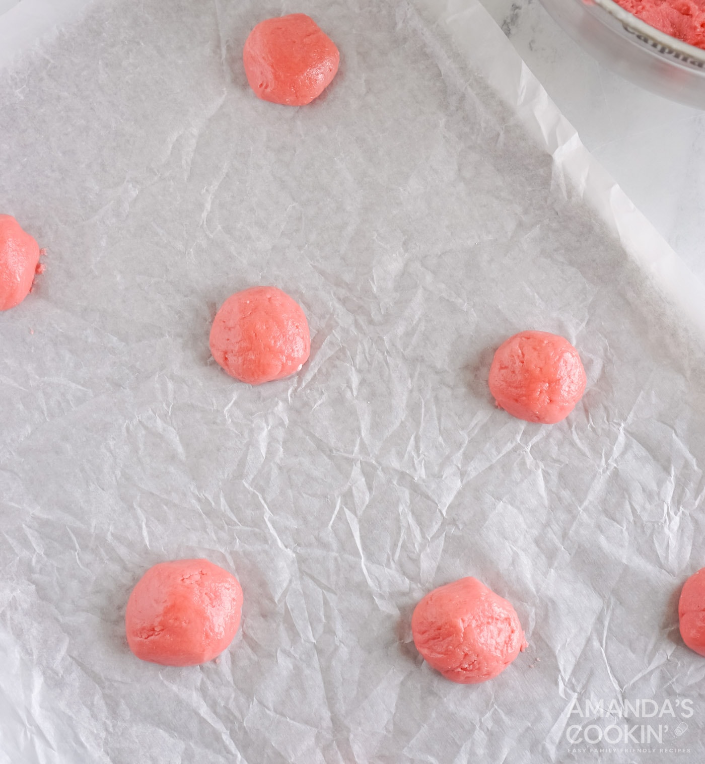 cake mix cookies on parchment paper