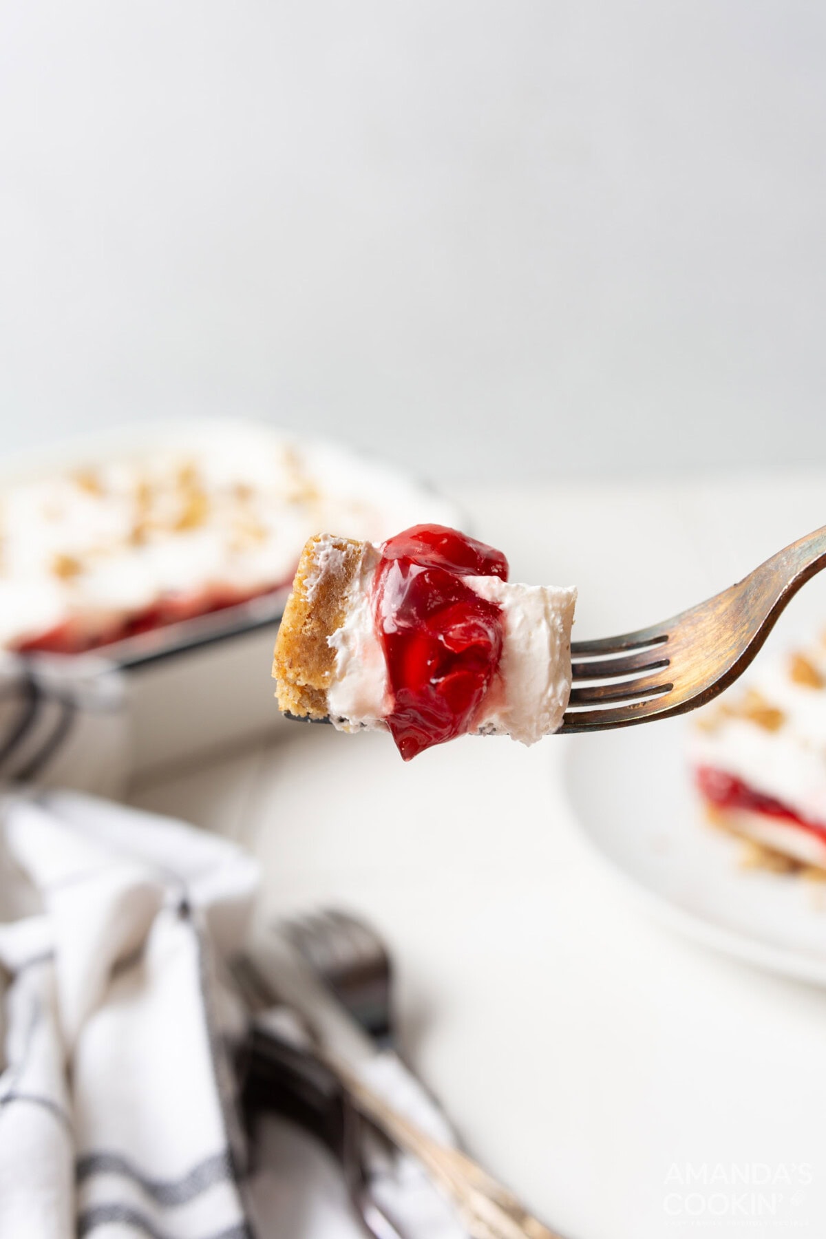 fork of cherry lush dessert