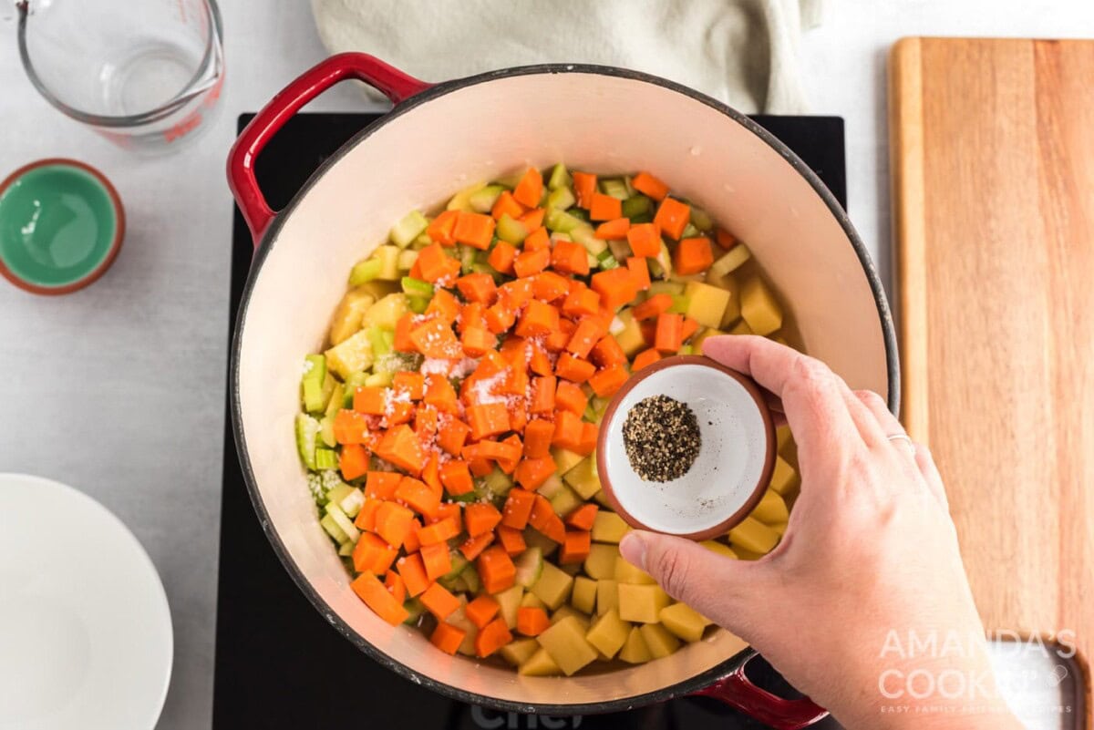 potatoes, carrots, celery, chicken broth and pepper in a saucepan