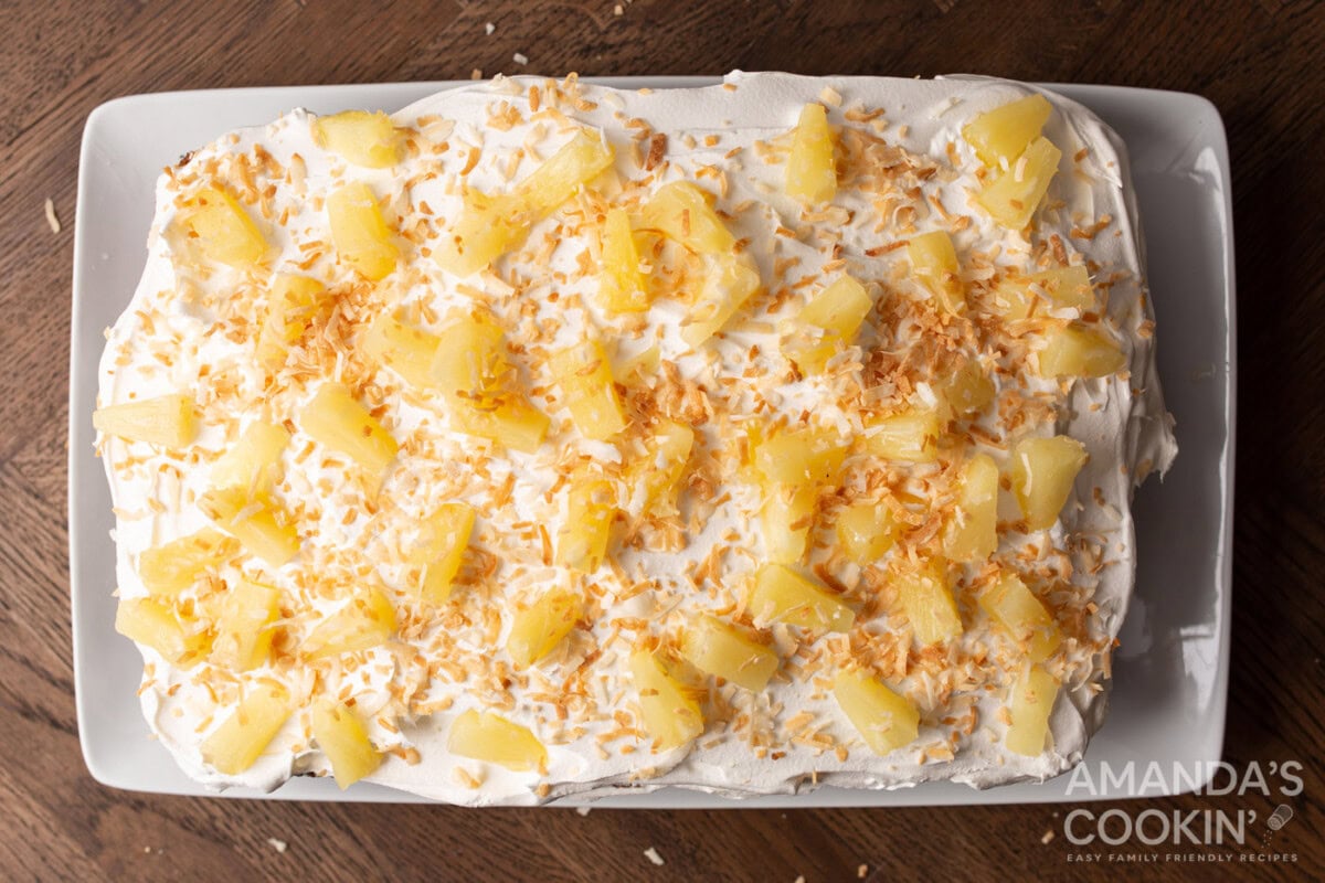 pineapple cake overhead with pineapple chunks and toasted coconut