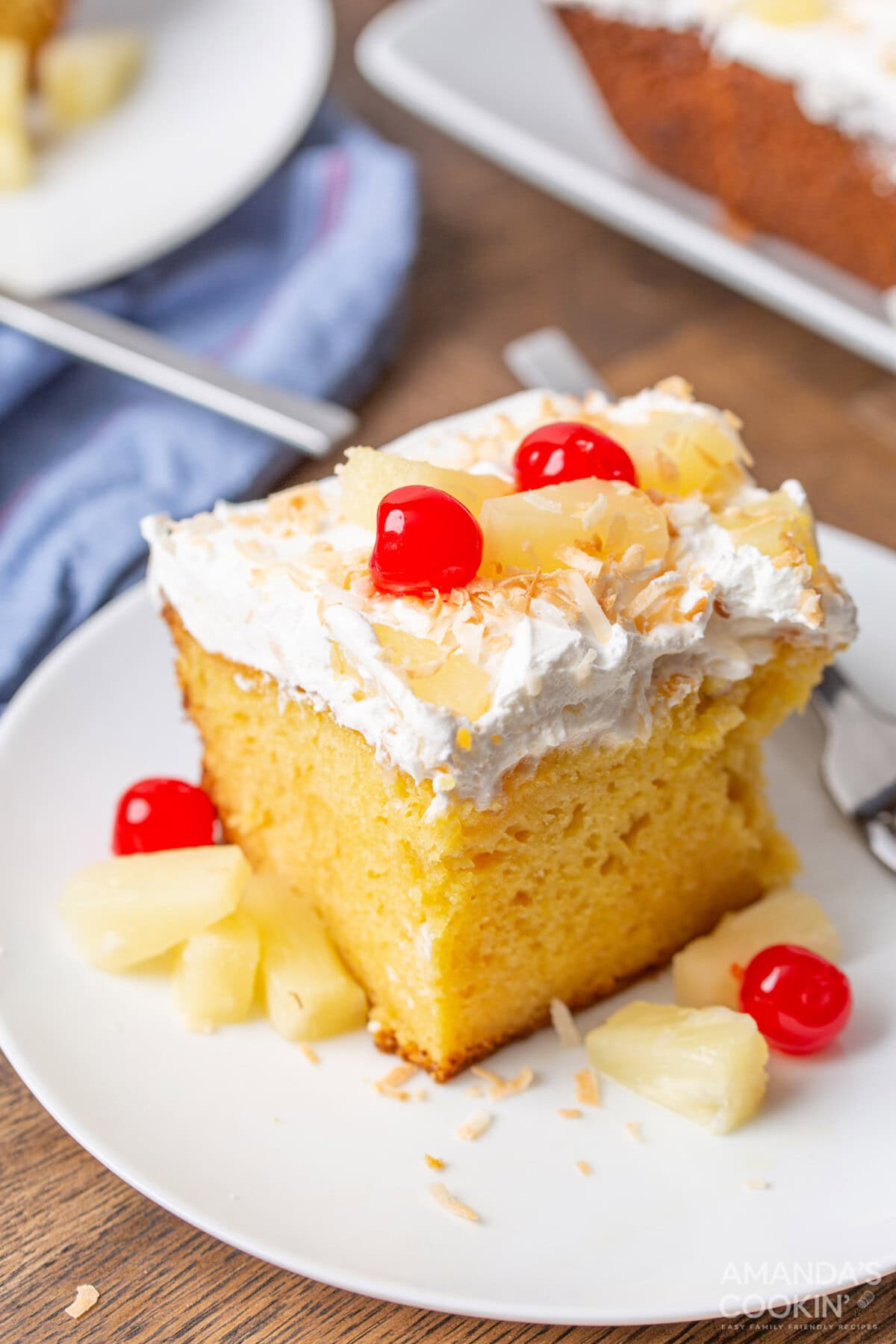 slice of pineapple poke cake