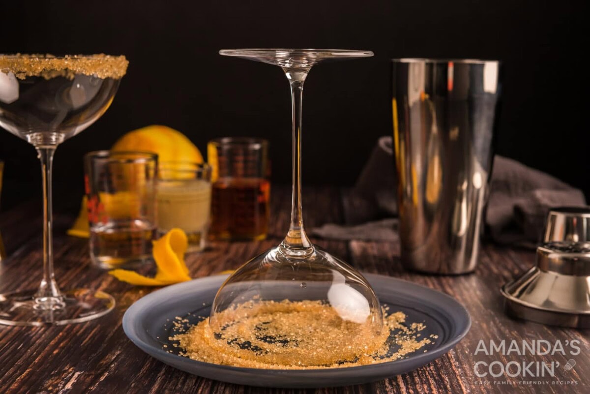 dipping cocktail glass into sugar