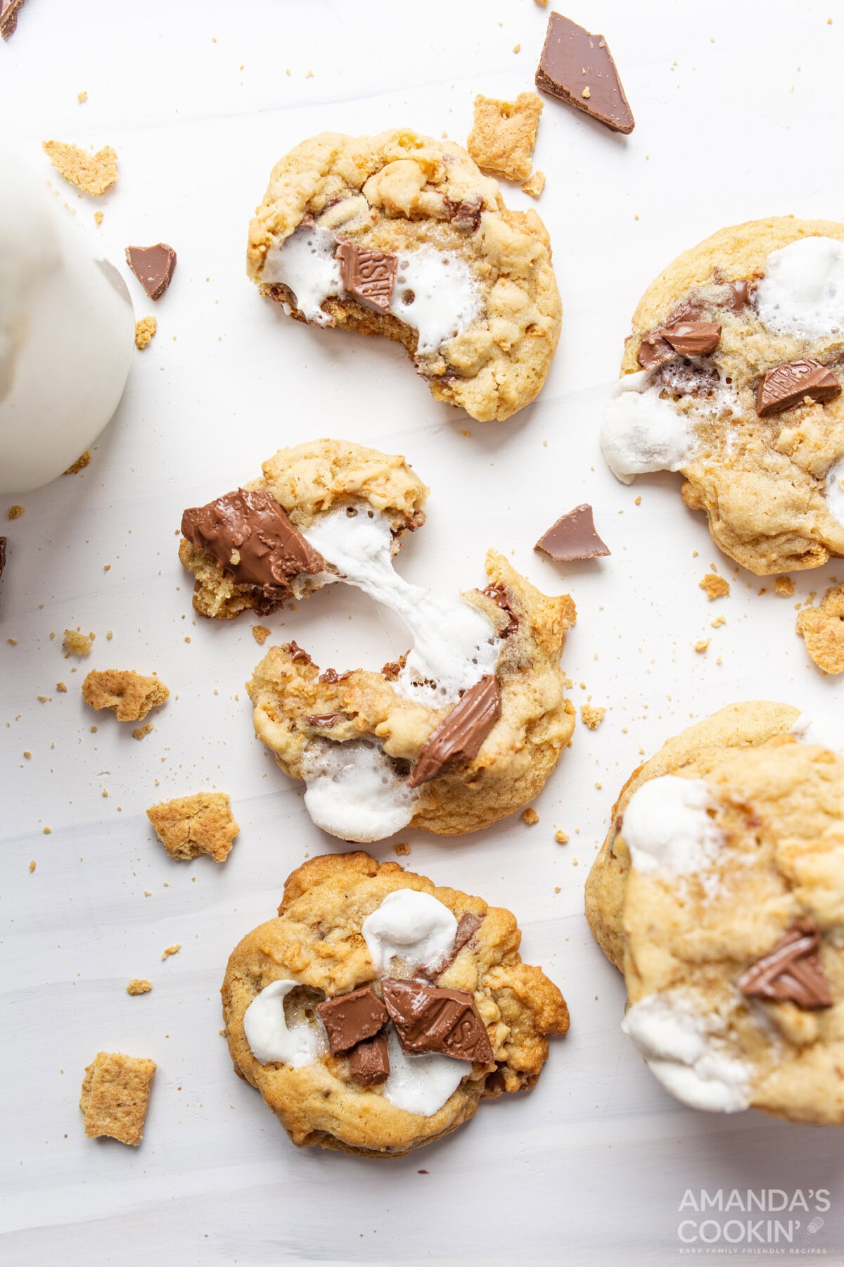 a smores cookie pulled apart to show marshmallow
