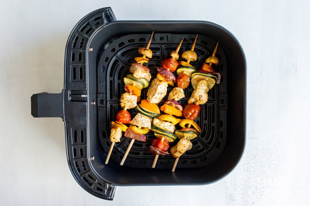 grilled chicken kabobs in an air fryer basket