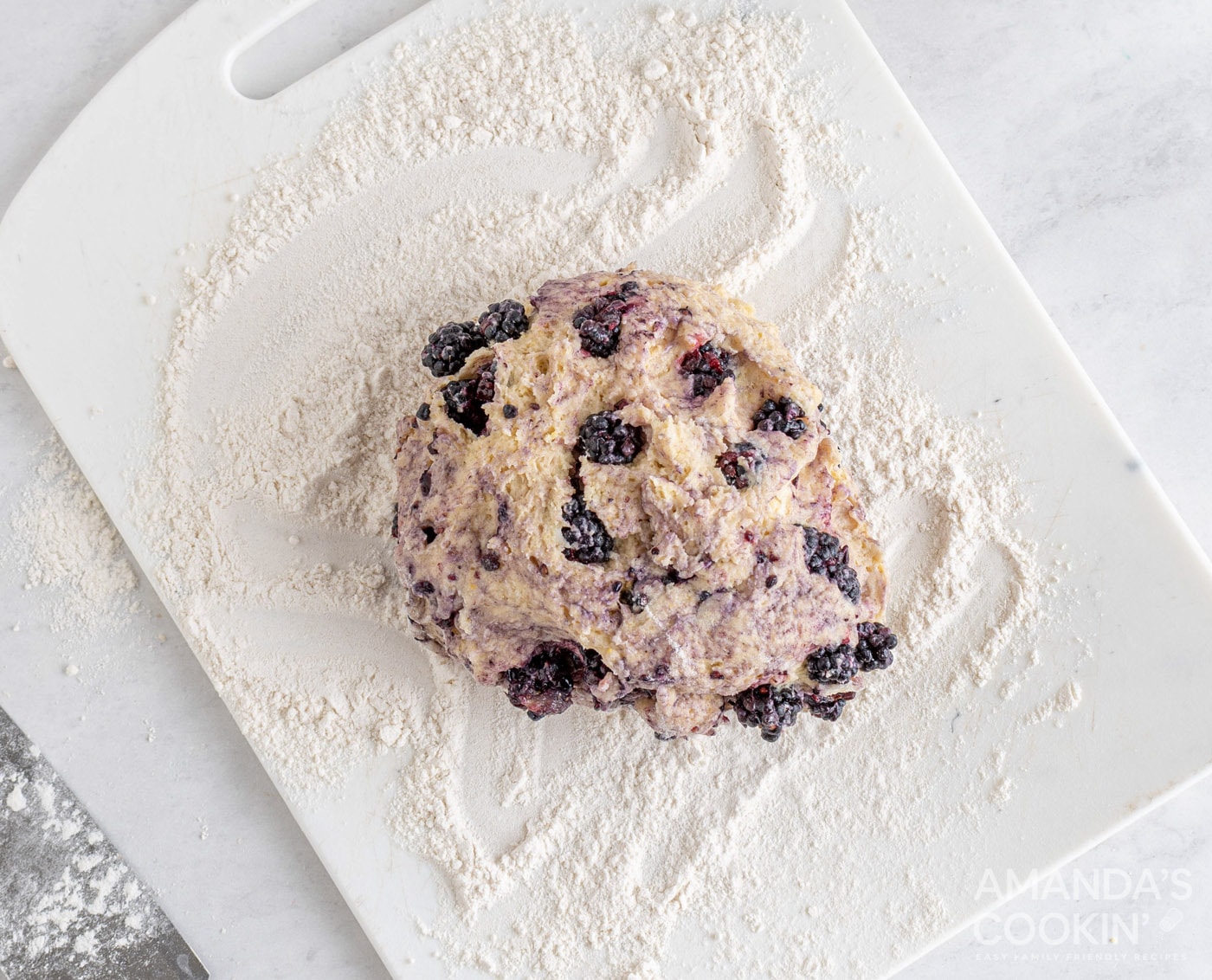 blackberry scone dough on floured cutting board