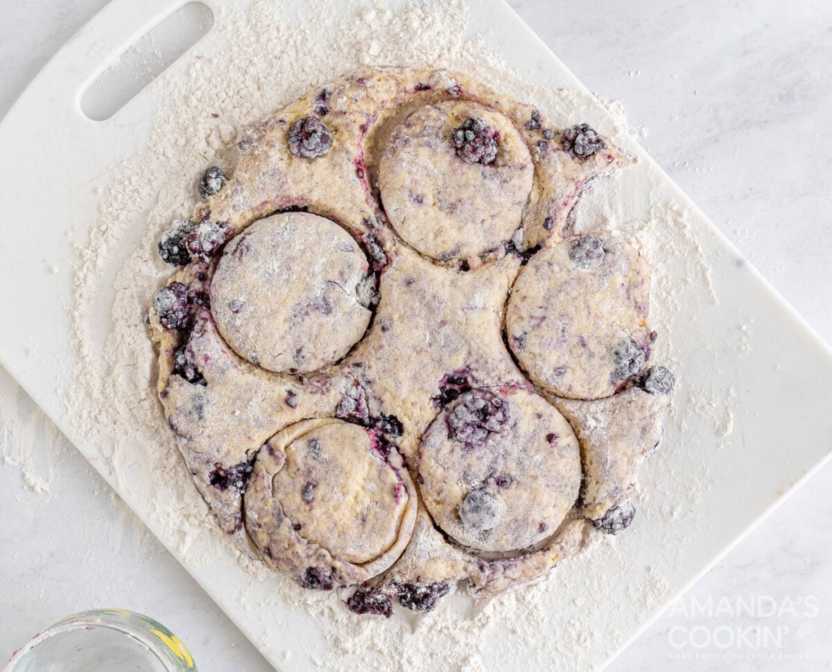 cutting out blackberry scone dough