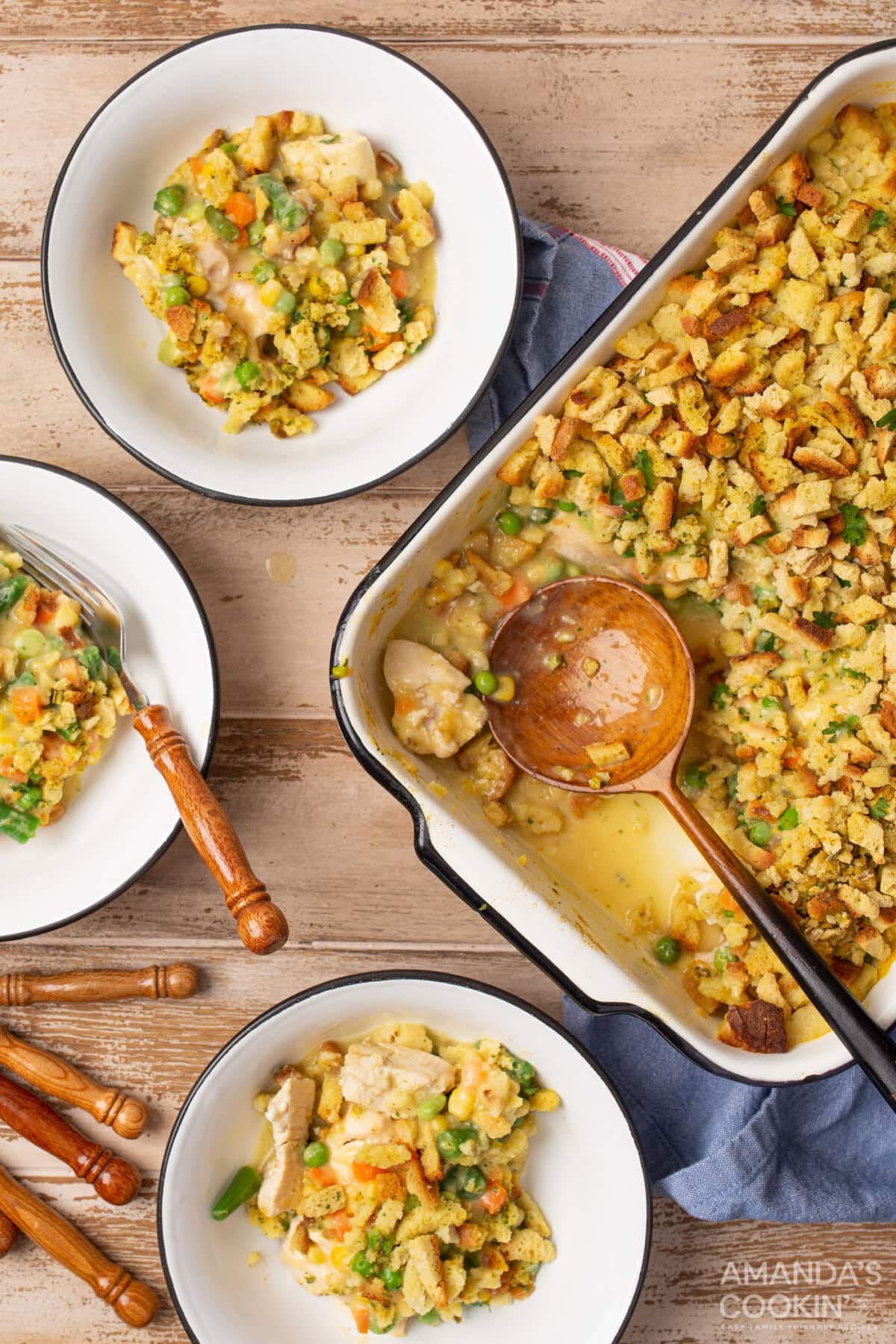pan of Chicken Stuffing Casserole and serving dishes