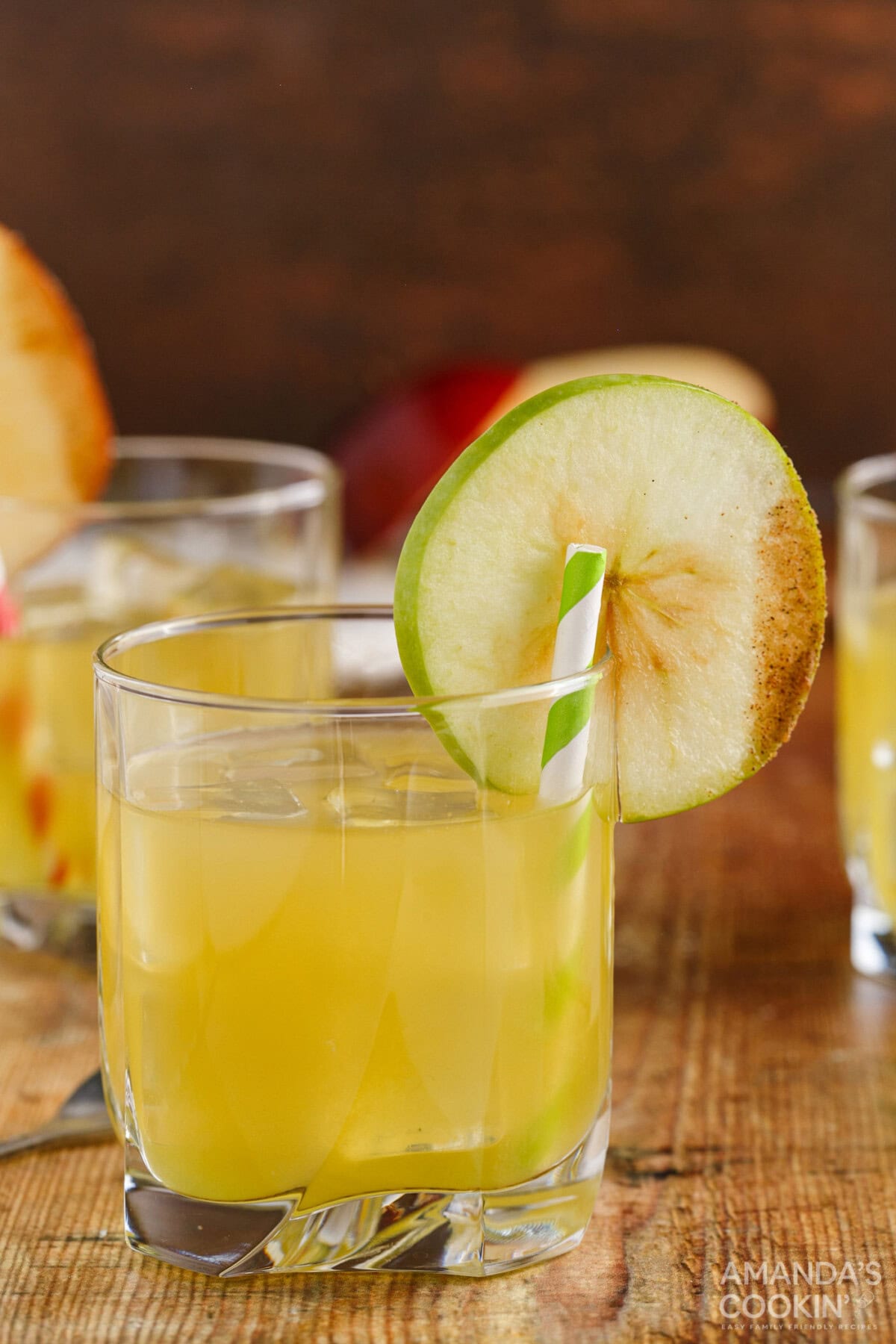 Cinnamon Applesauce Cocktail in a rock glass with apple garnish