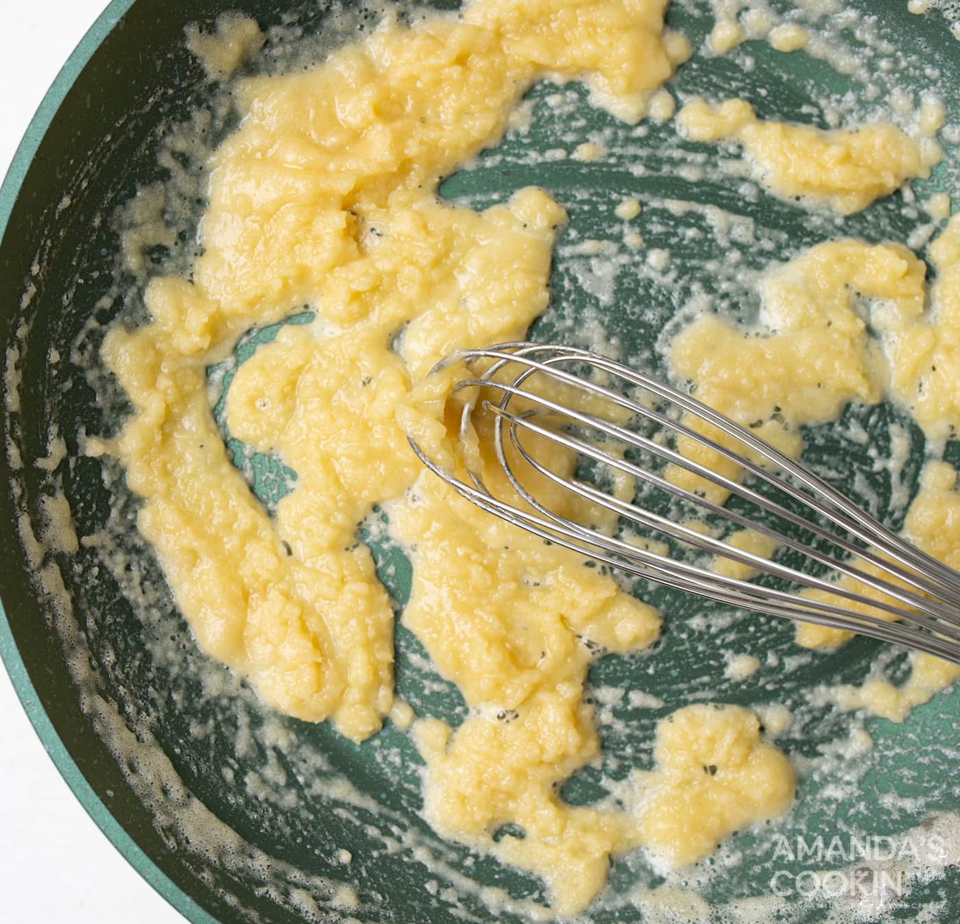 whisking butter and flour in a skillet