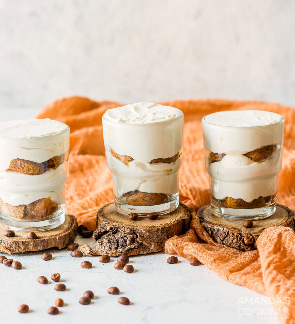 mascarpone cheese mixture with ladyfingers in a cup