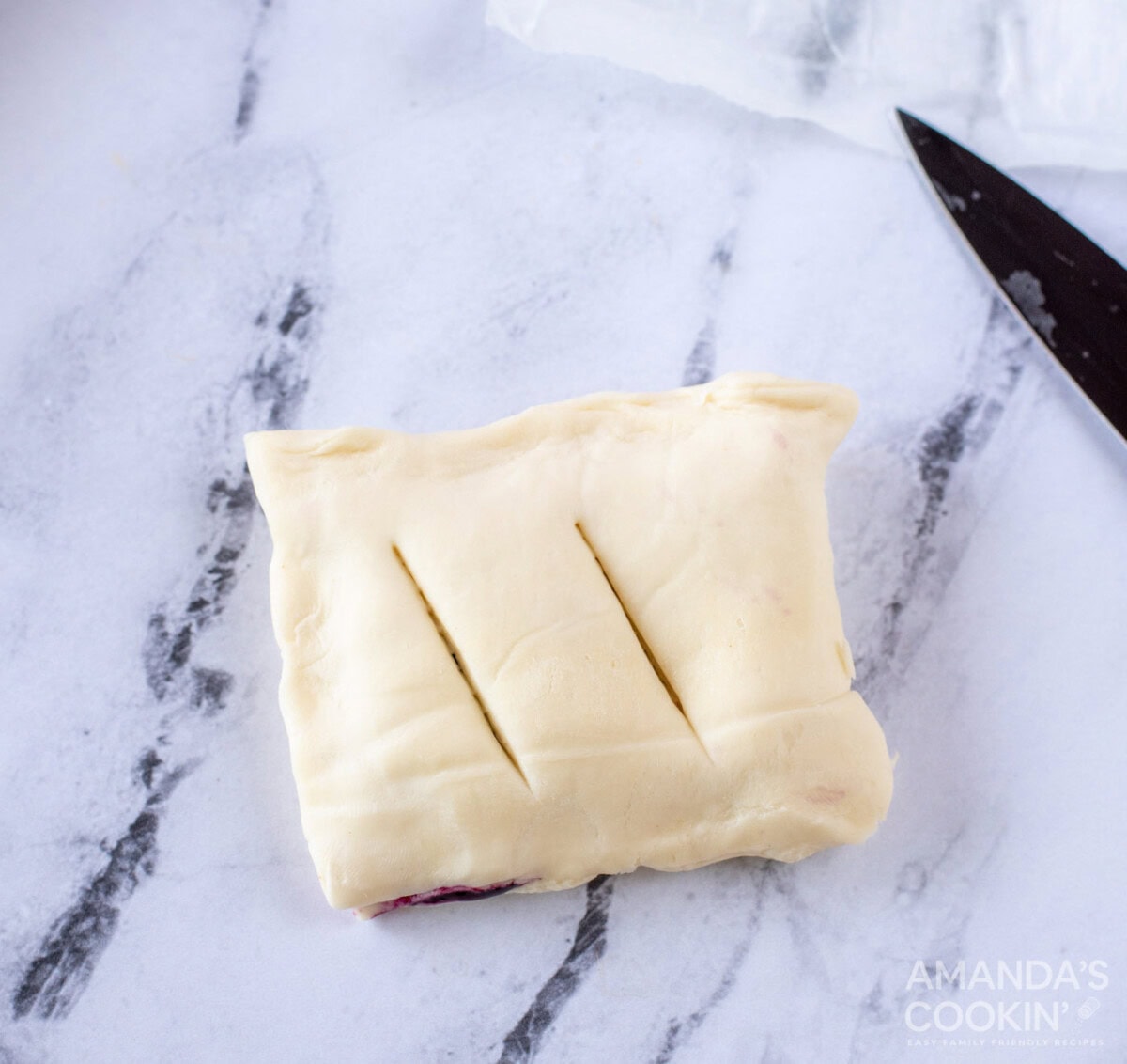 slits cut on top of pastry