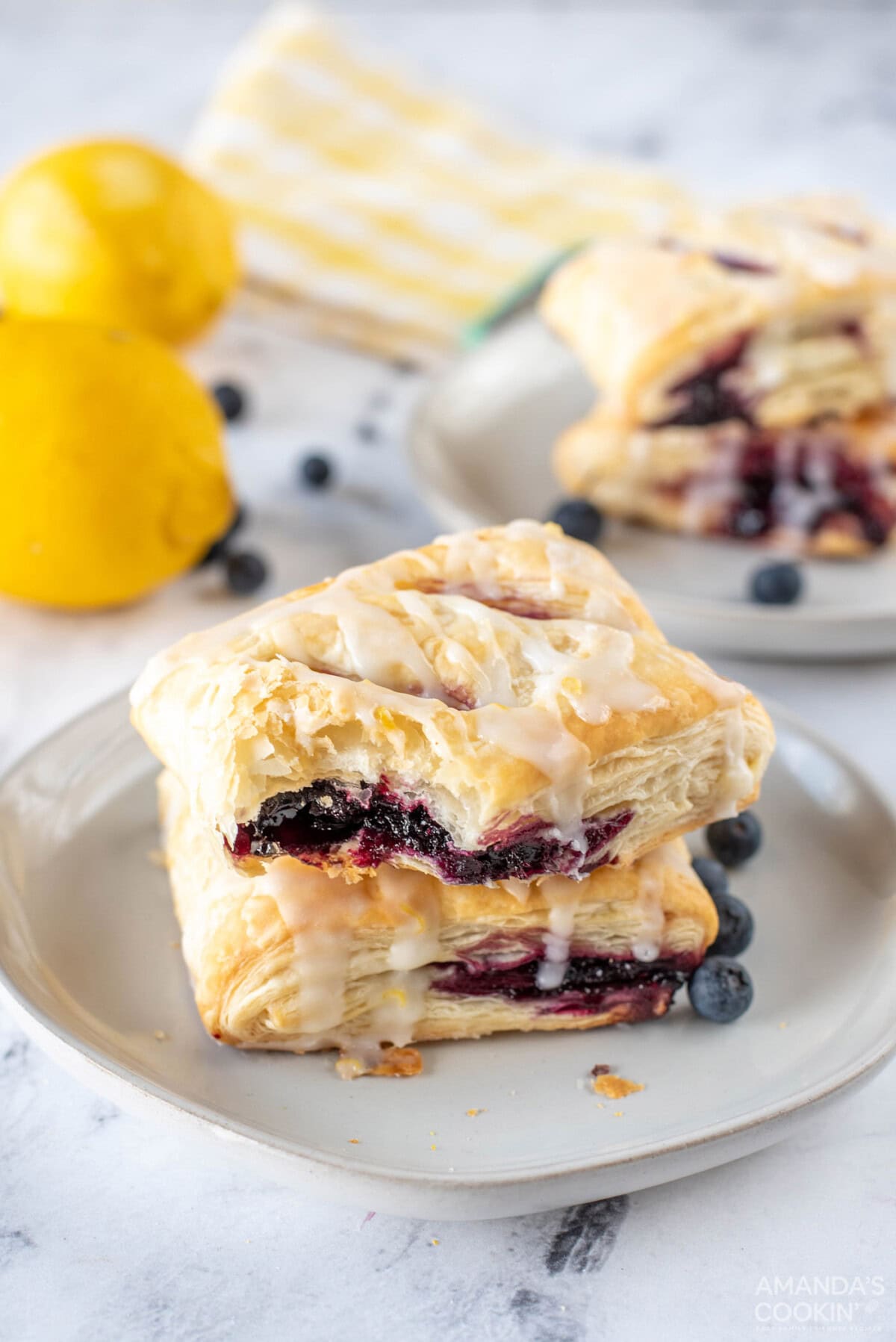 Lemon Blueberry Croissant Hand Pie with a bite out of it
