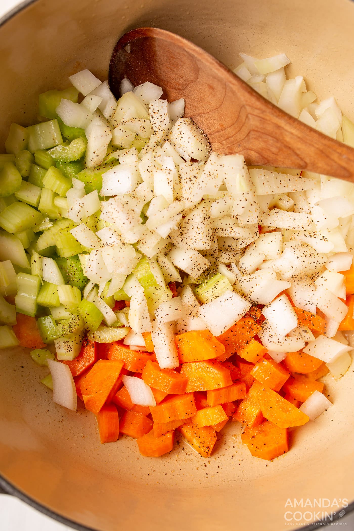 carrots, onion, and celery in a pot