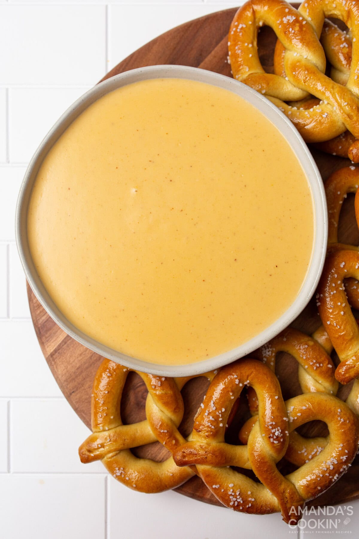 bowl of Beer Cheese Dip surrounded by pretzels