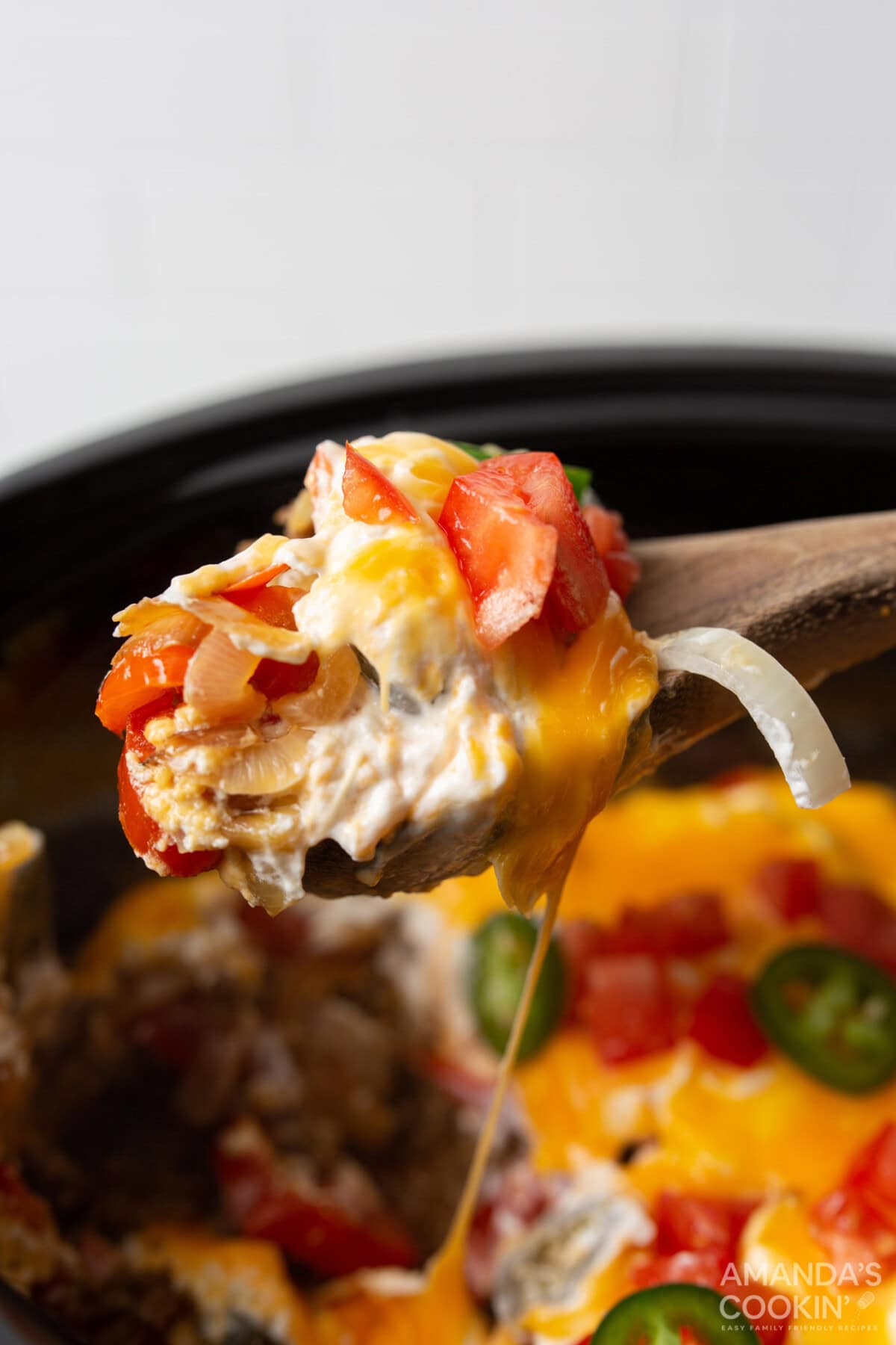 serving spoon of crockpot john wayne casserole