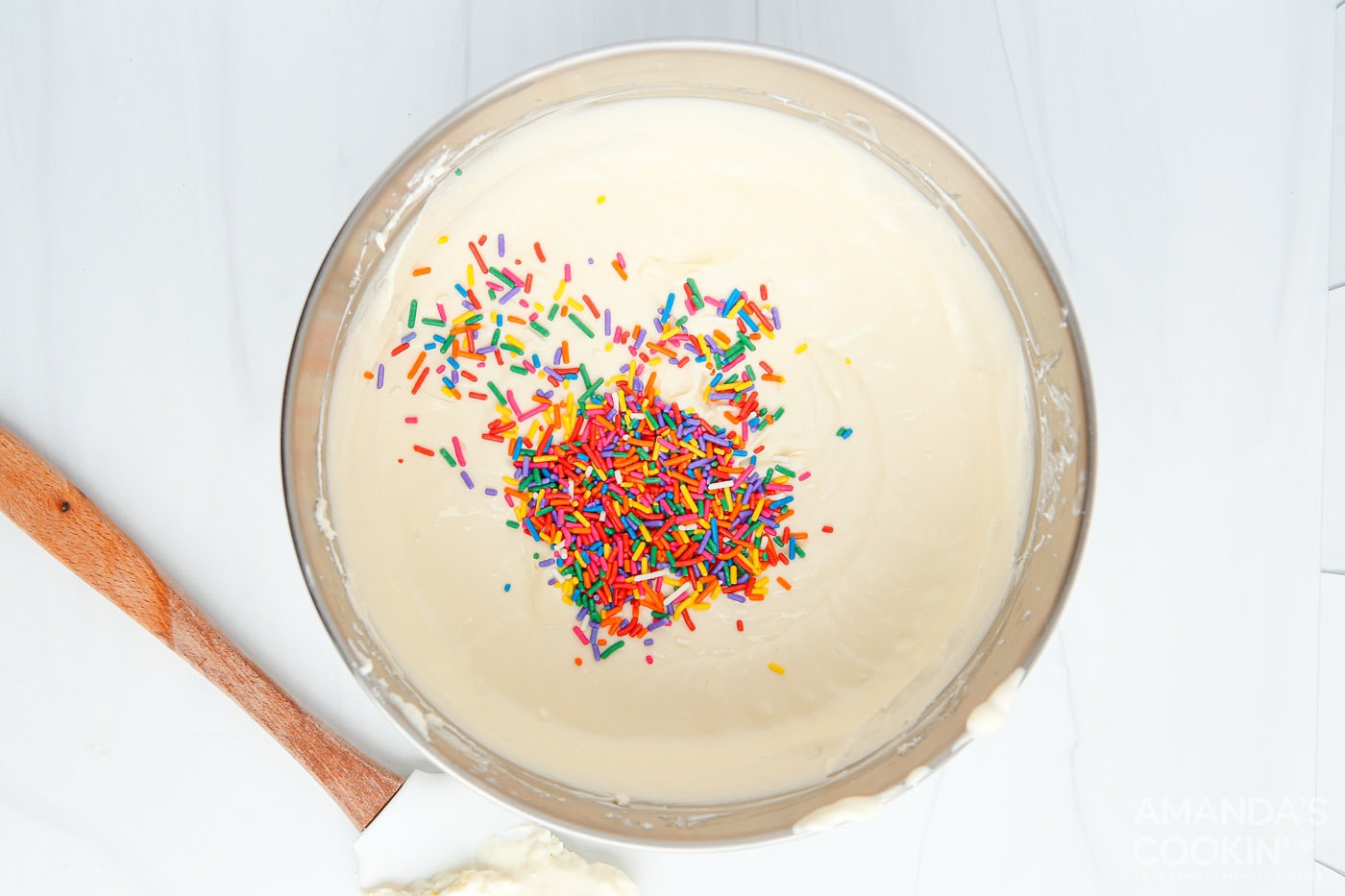 cream cheese mixture with funfetti sprinkles in a bowl