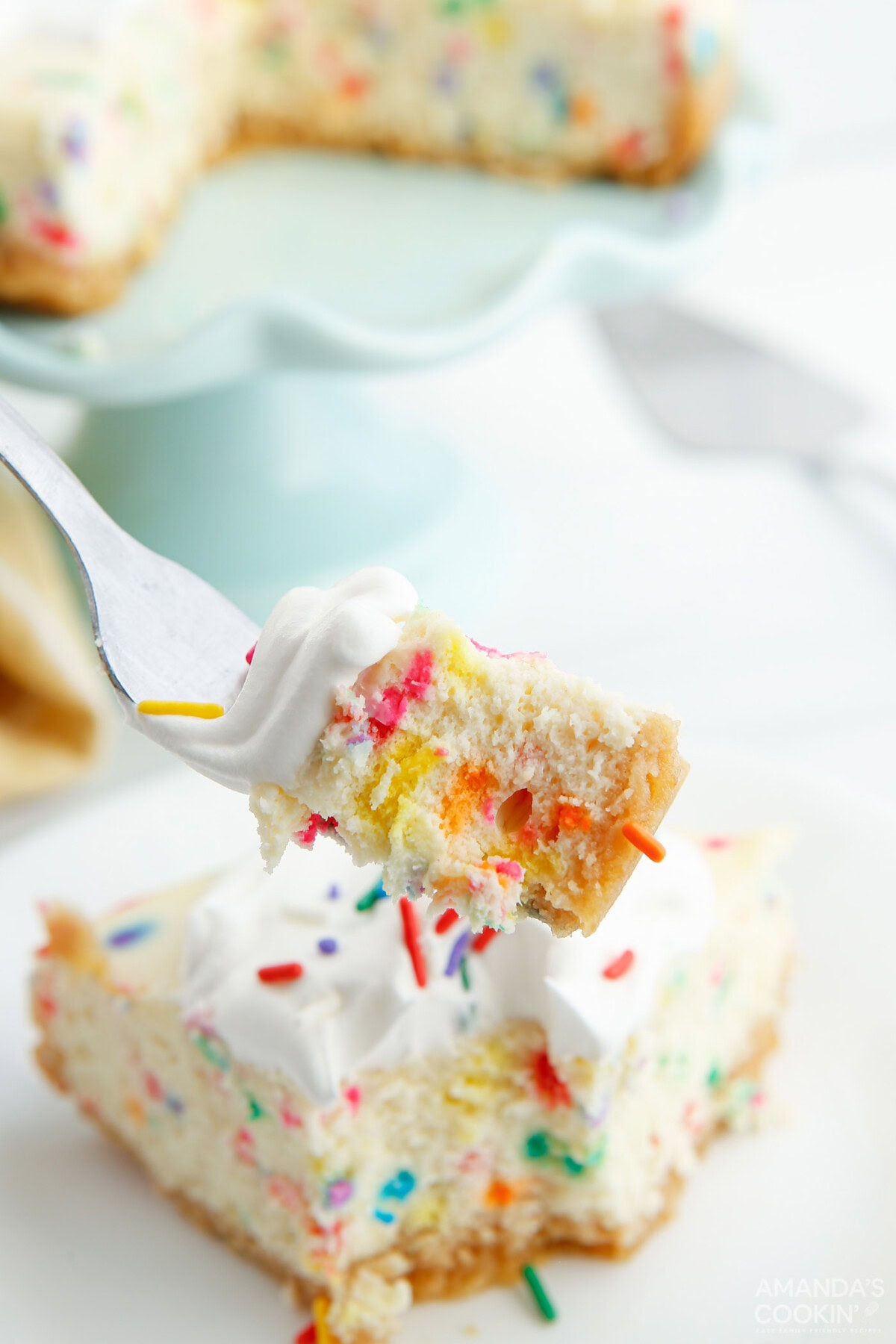 fork full of Instant Pot Funfetti Cheesecake