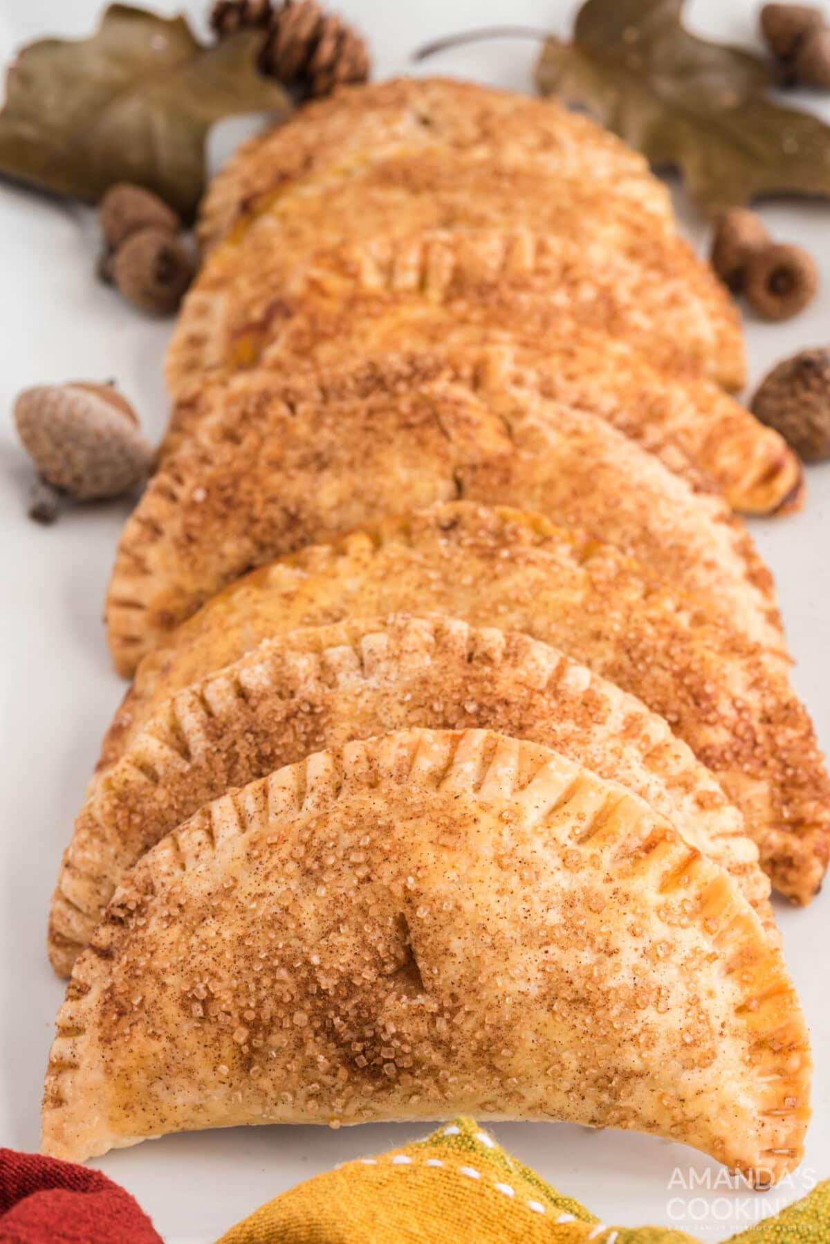 several Pumpkin Hand Pies on a plate