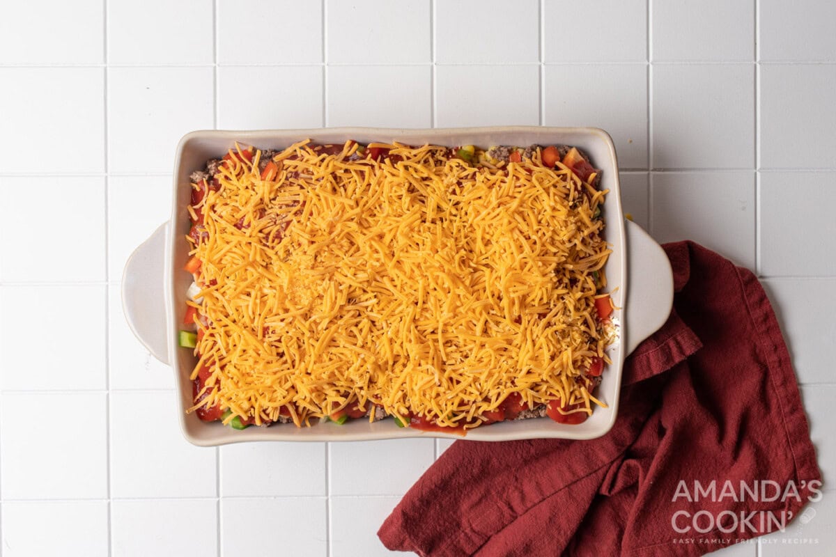 shredded cheese on top of casserole