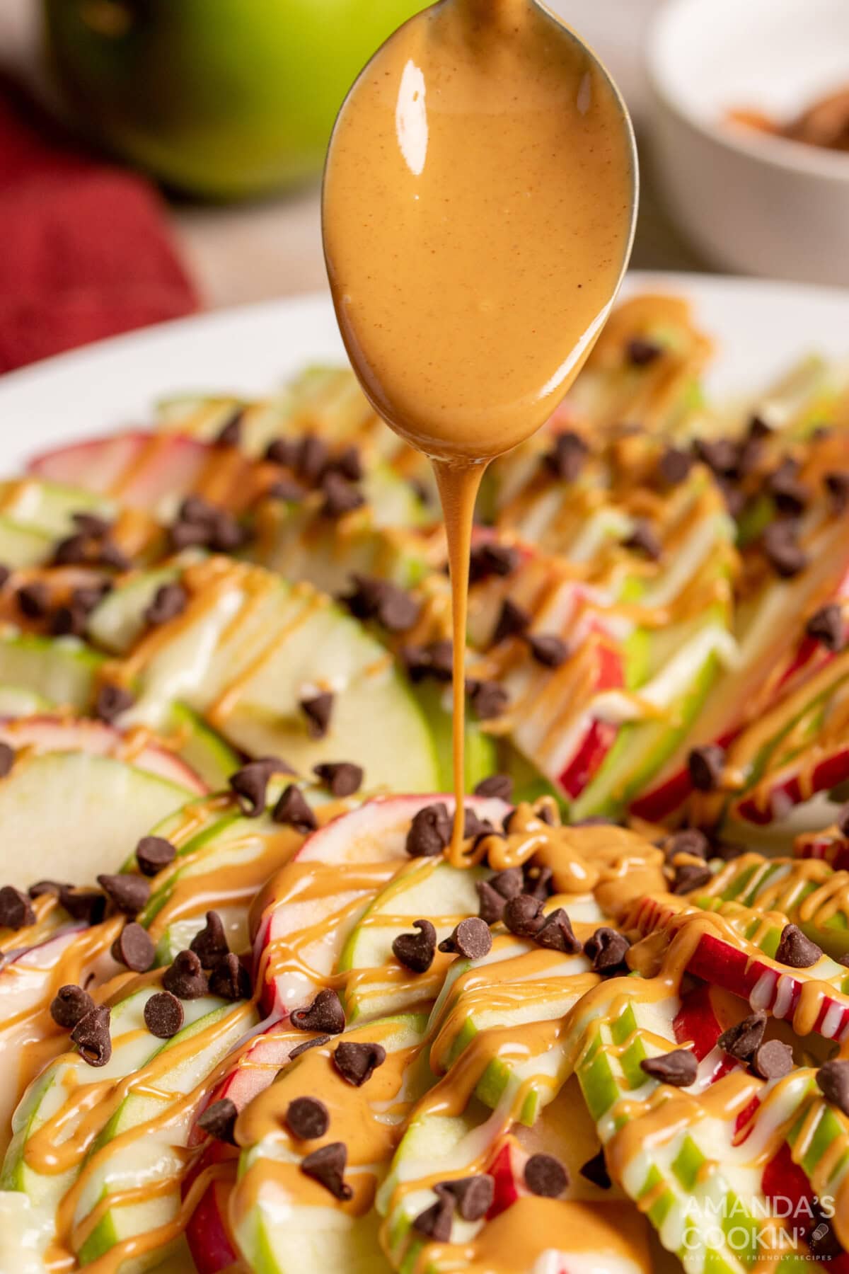 drizzle peanut butter on Apple Nachos