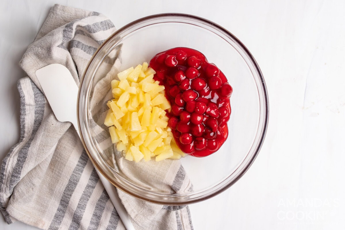 cherry pie filling and pineapple in a bowl